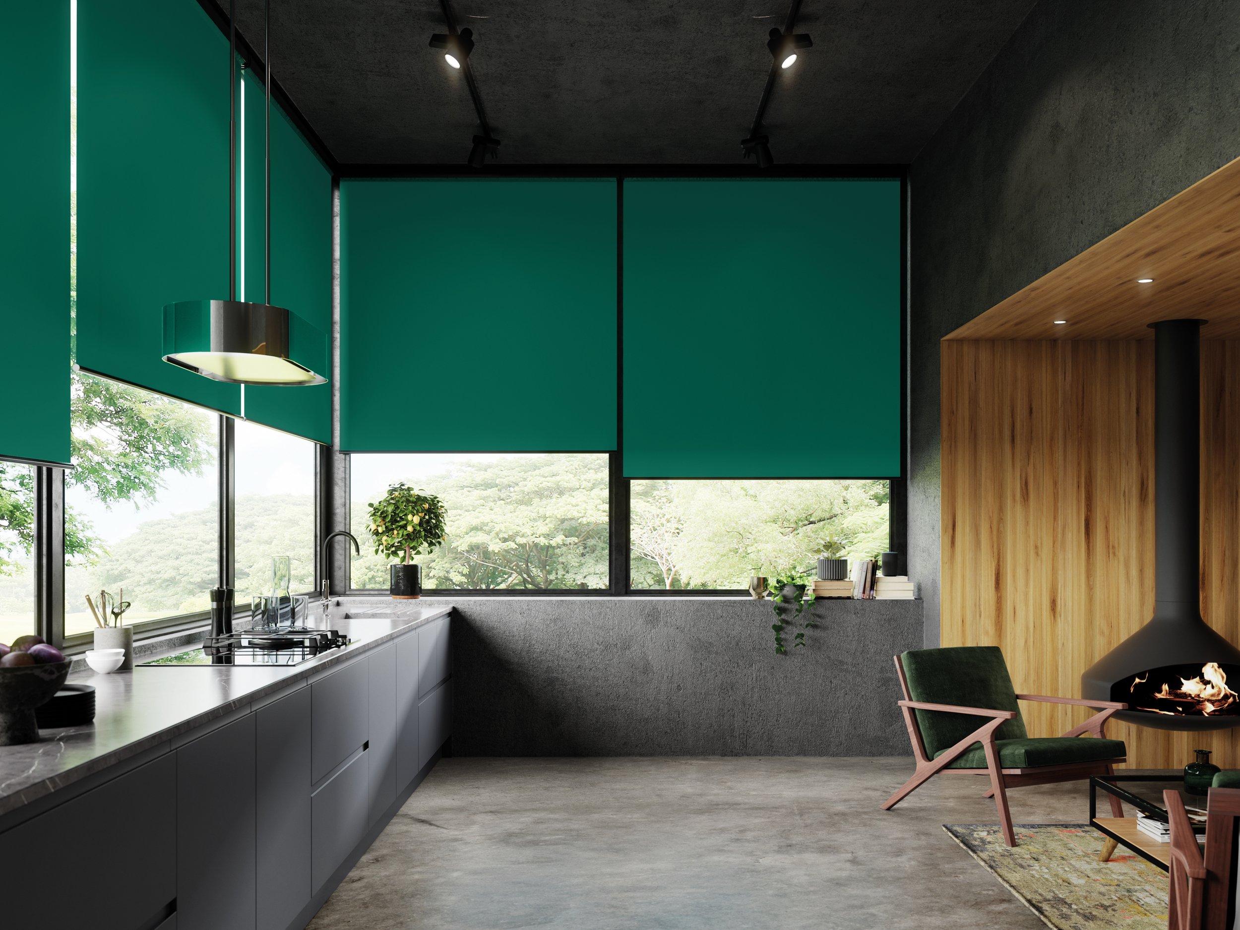 Modern kitchen and living area with grey cabinets, teal roller blinds, a green chair, and a black hanging fireplace.