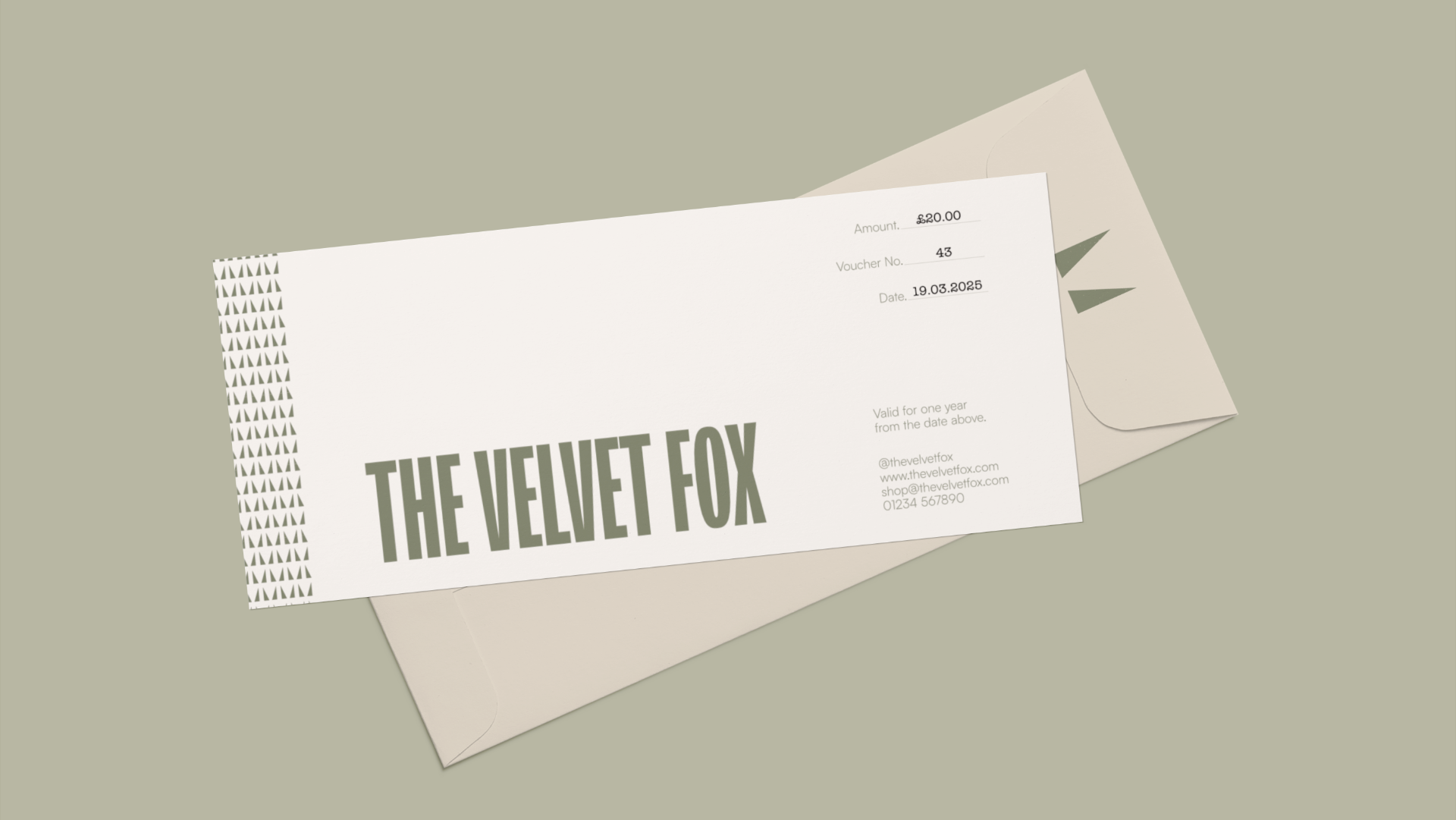 Business check with the logo 'The Velvet Fox,' amount of $20, and date 19.03.2025, placed on top of an envelope on a light green surface.