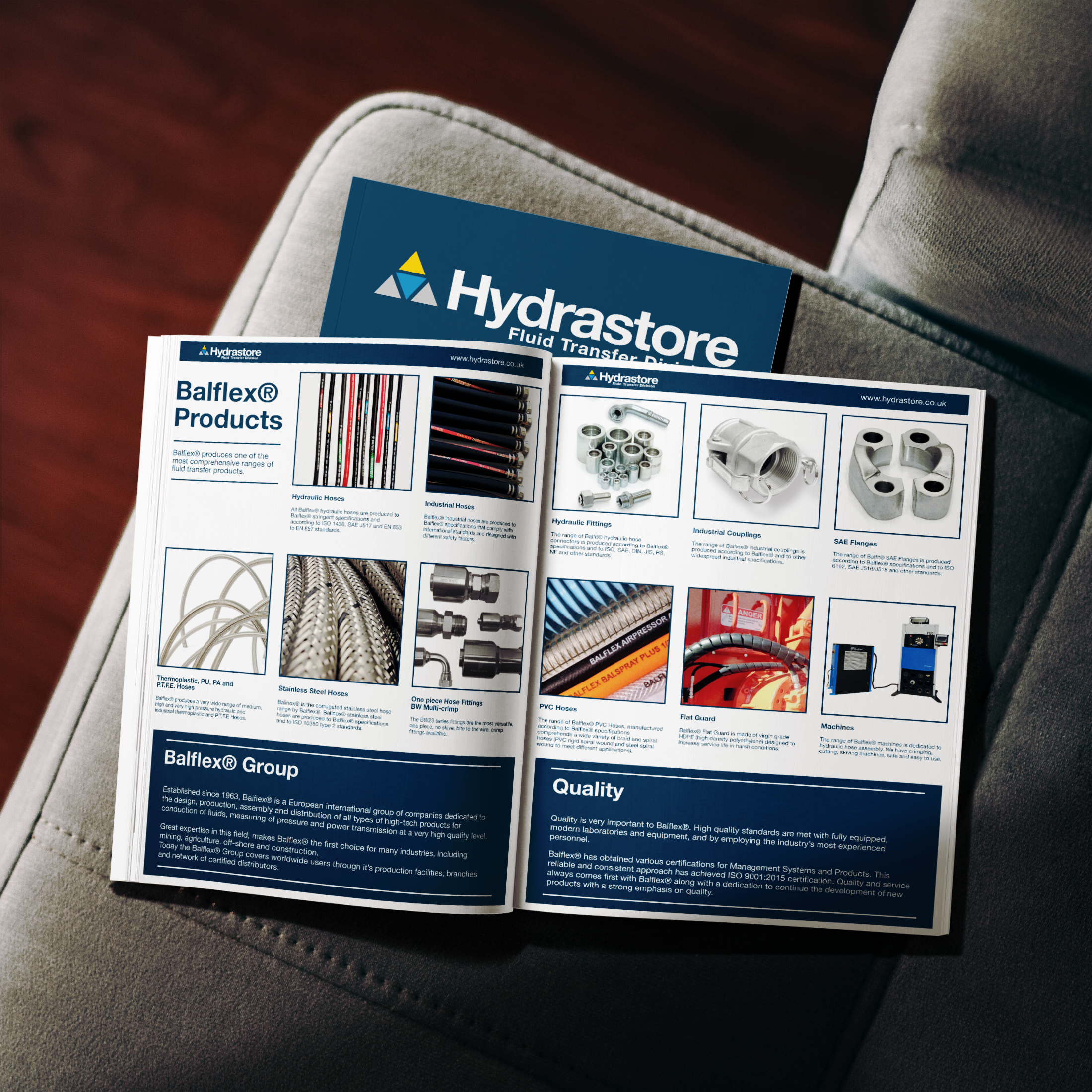 A brochure or catalog for Hydrastore, showing various fluid transfer products such as hoses, fittings, couplings, and valves.