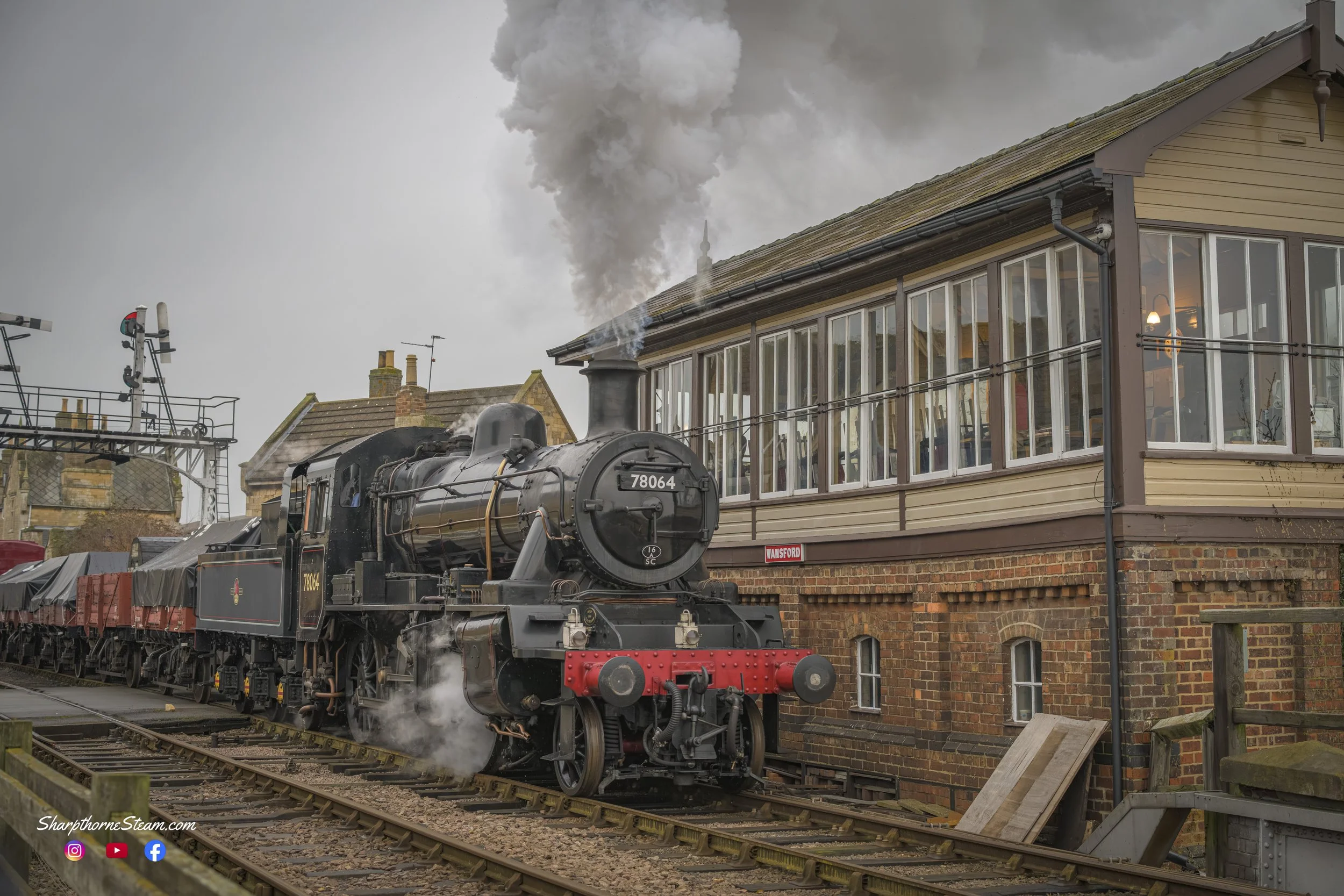 Passing the Box - On departing Wansford Station, No78064 passes the wonderful Wansford Signal Box, built in 1907. 