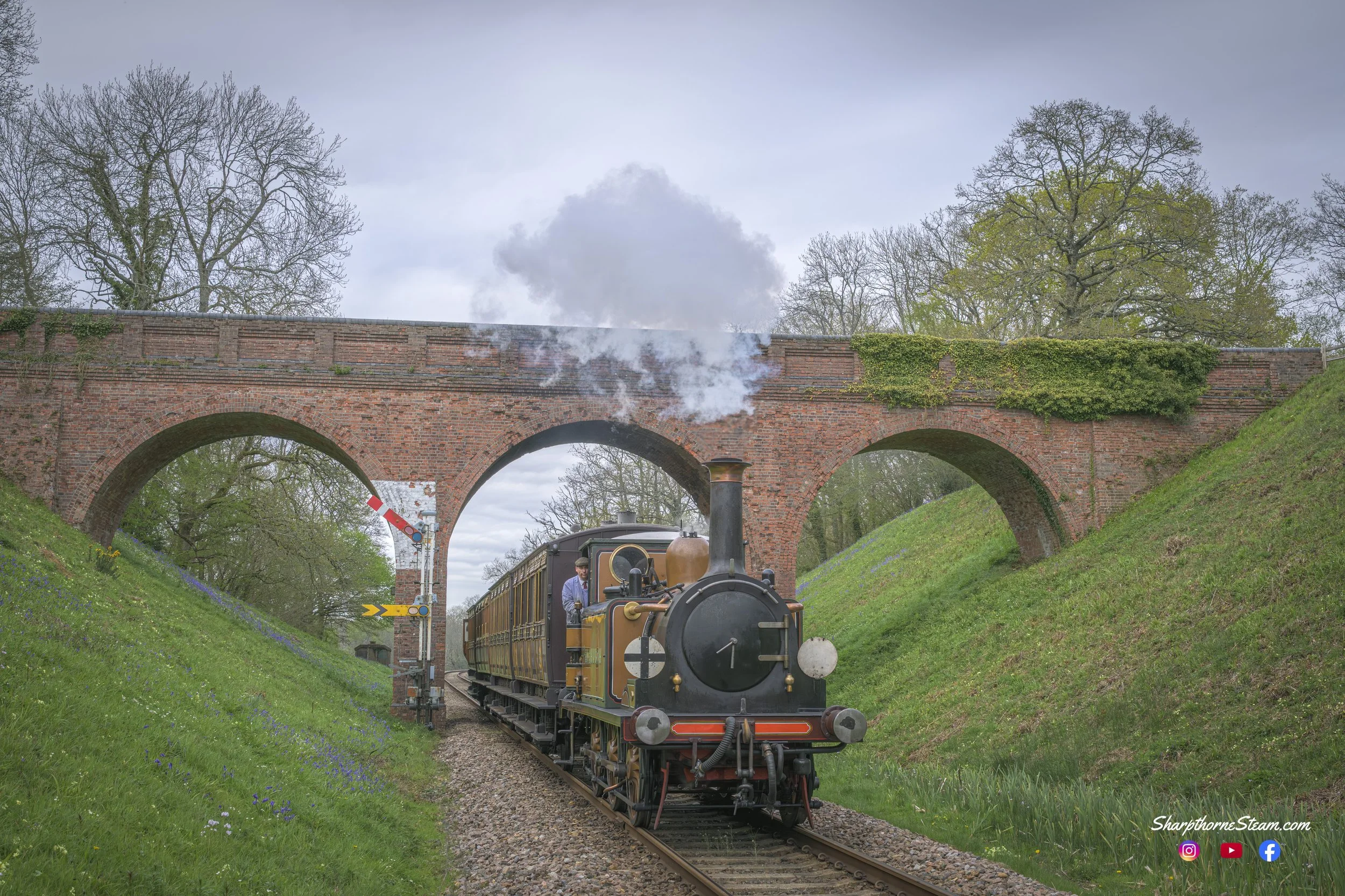 Greying Clouds - No72 under increasingly grey clouds heads south passing through Three Arch Bridge.