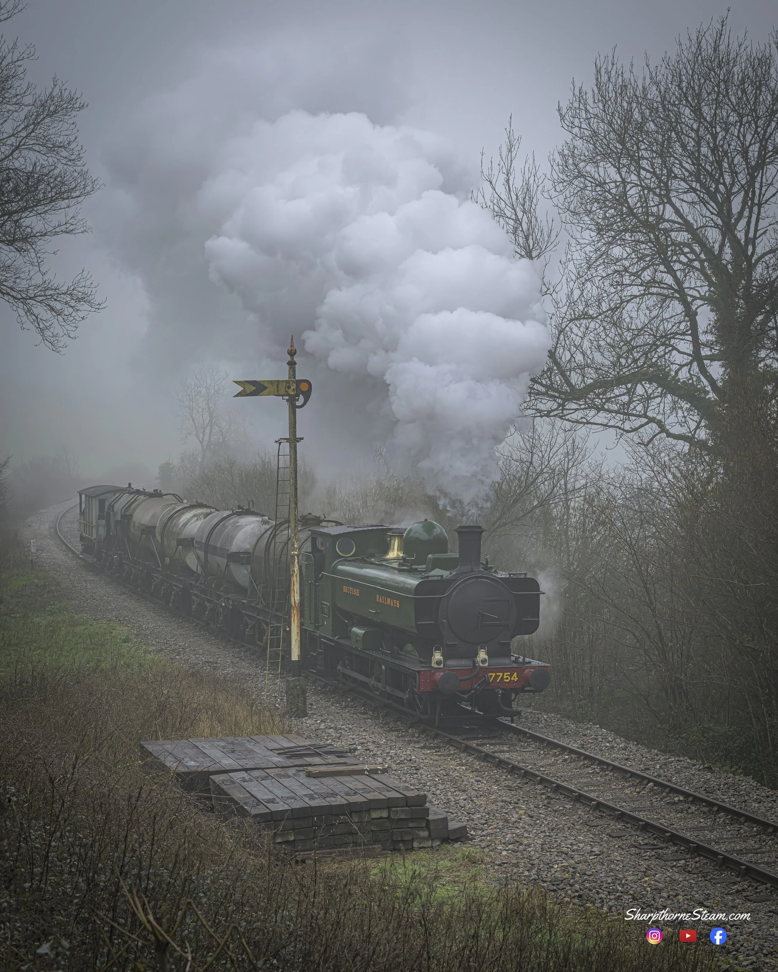 Pannier through the Mist - No7754 with a good head of steam races past of the camera.