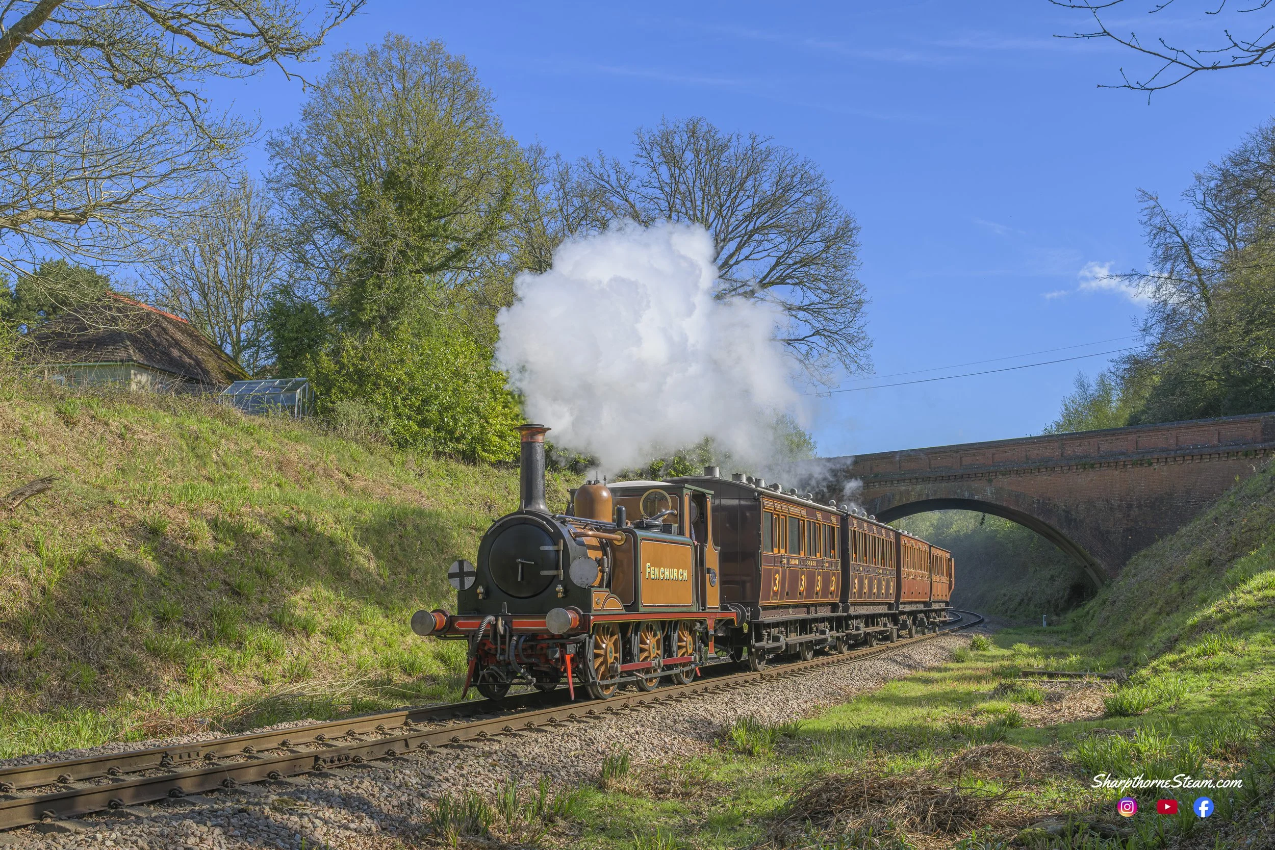 Northern Terrier - No72 is seen having just left East Grinstead and passing under Imberhorne Lane Bridge