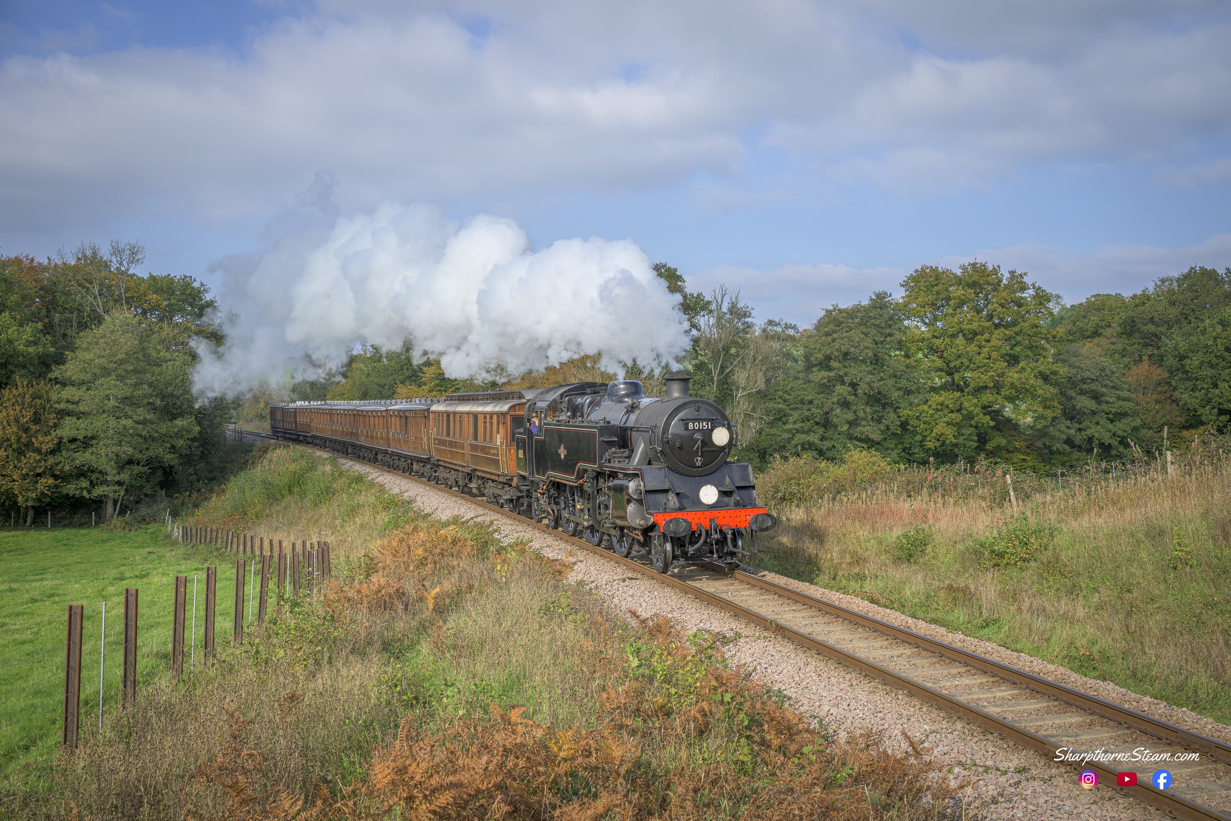 A Standard Day - Standard 4 No80151 the workhorse of the Bluebell Railway fleet passes Tremains with a vigilant driver keeping a good look out. (Oct'25)