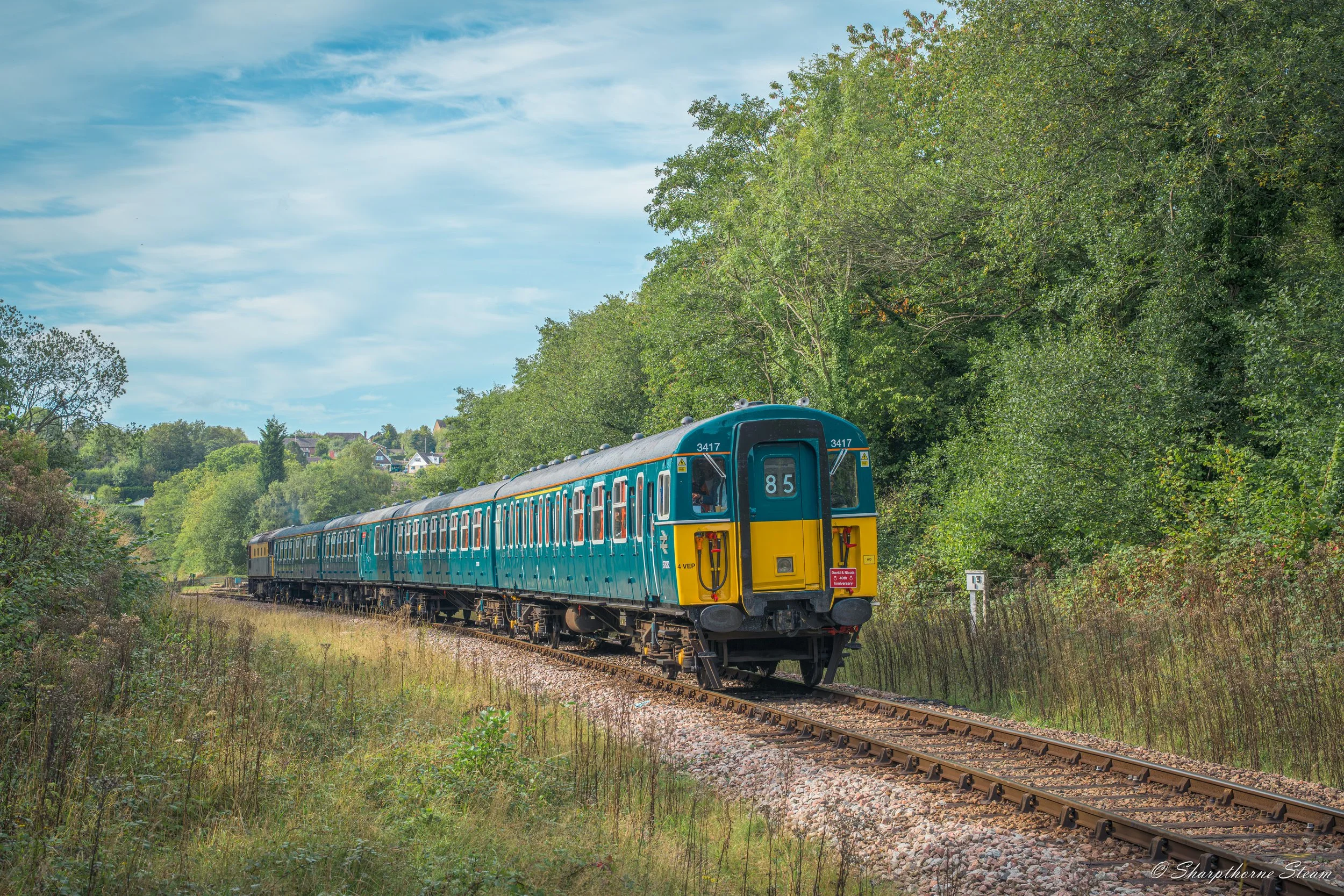 Shaprthorne Slamdoor - With Sharpthorne in the background No3417 assisted by No33108 on the rear round the curve towards New Coombe Bridge