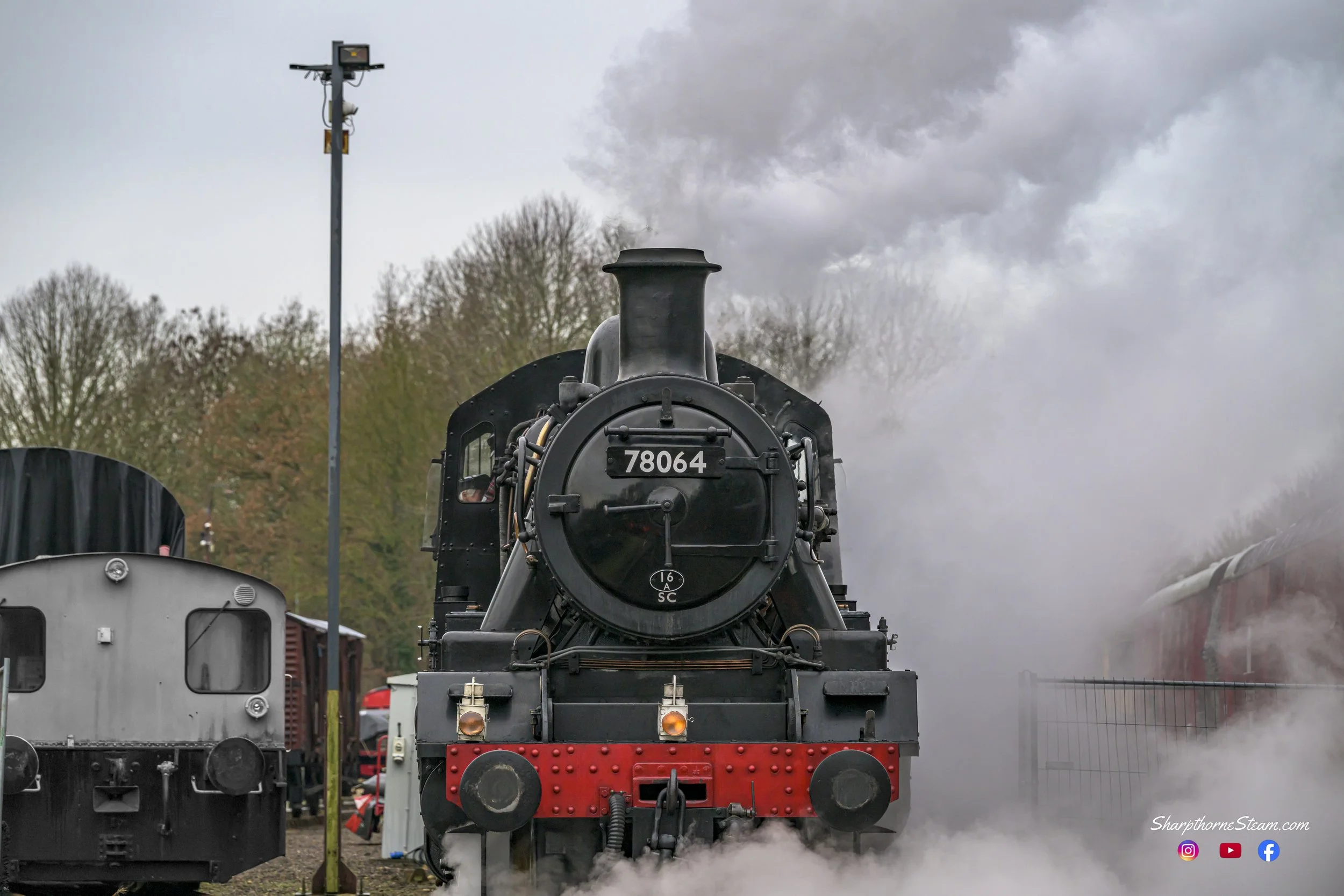 Warming Up - No78064 raises steam as she prepares for ground signal to release her onto the mainline.
