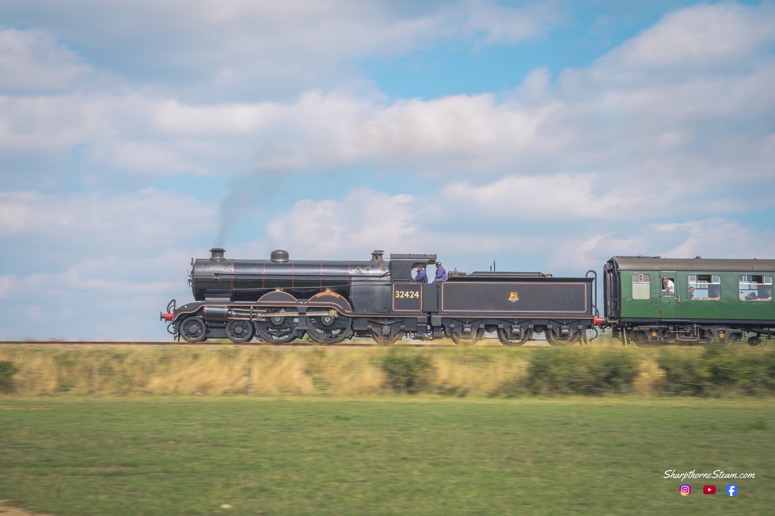 Summer Comes Soonest in South - No32424 "Beachy Head" races north with a branchline running towards Horsted Keynes during the 65th anniversary celebrations. (Aug'25)