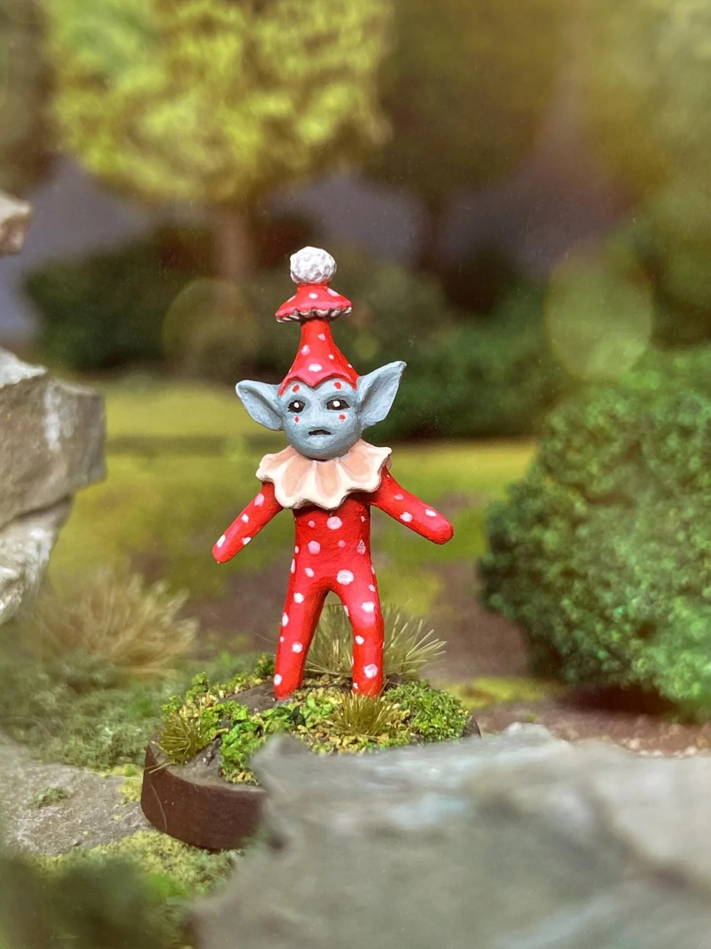 Little Amanita, a fae jester in the forest. You can pick her up along with all her friends on Kickstarter, link in my bio. You can also find a short painting vlog on my bio for Patreon members. #amanitamuscaria #faecore #ttrpg #sidhe #paintingminiatu