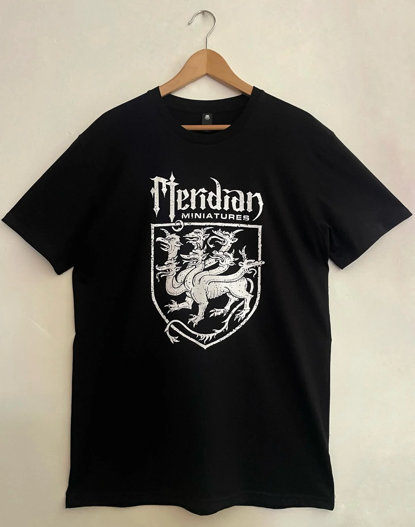 Our first T-Shirt! This design is based on a medieval crest, depicting a beast of the apocalypse. Expertly redrawn by Dave Needham AKA @zhu_industries . Printed in the UK by @motorthreadsstudio #indieminis #metalmerch #screenprintinguk #medievalart #