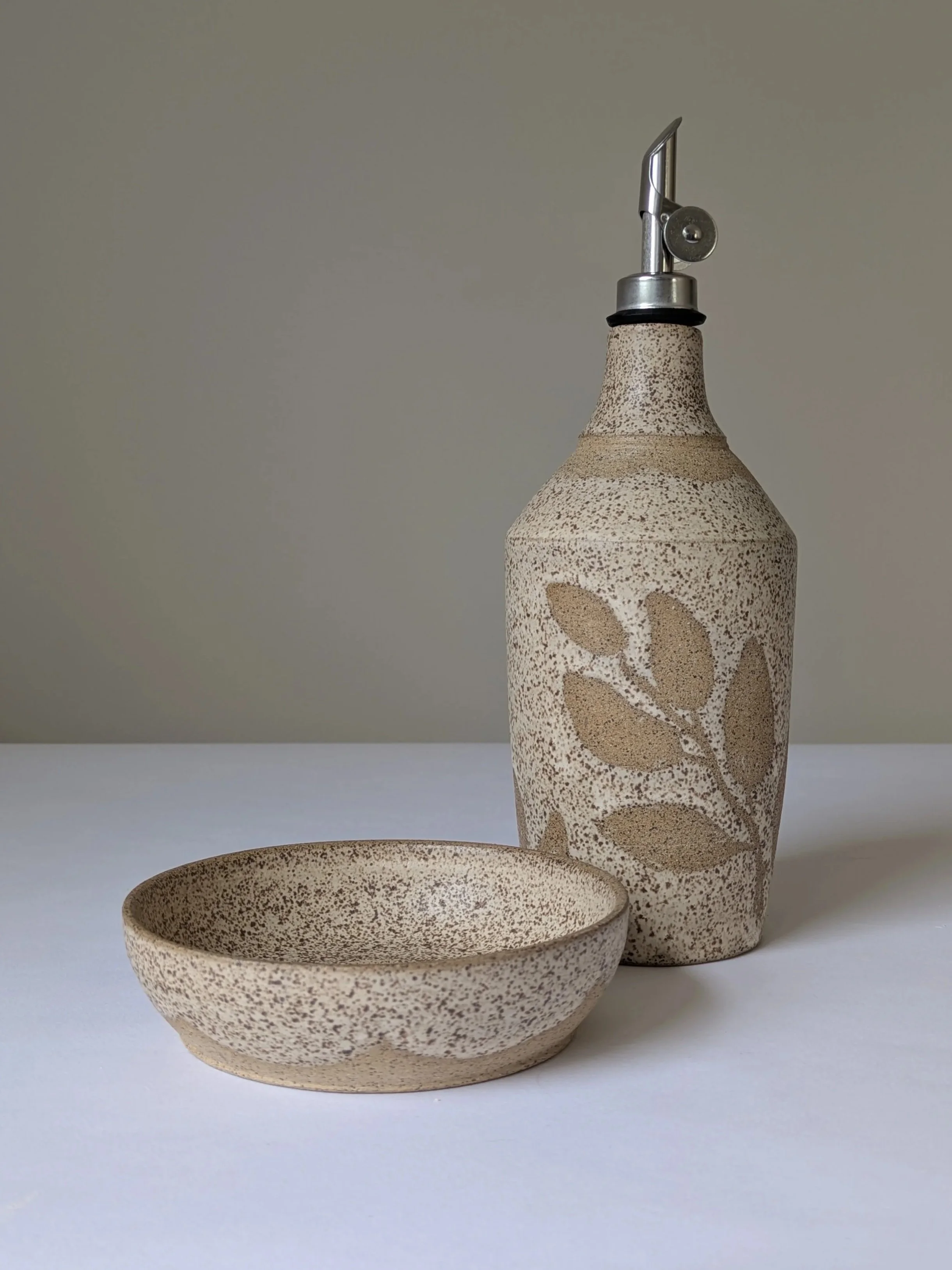 Olive Oil Bottle and Garlic Grater 
