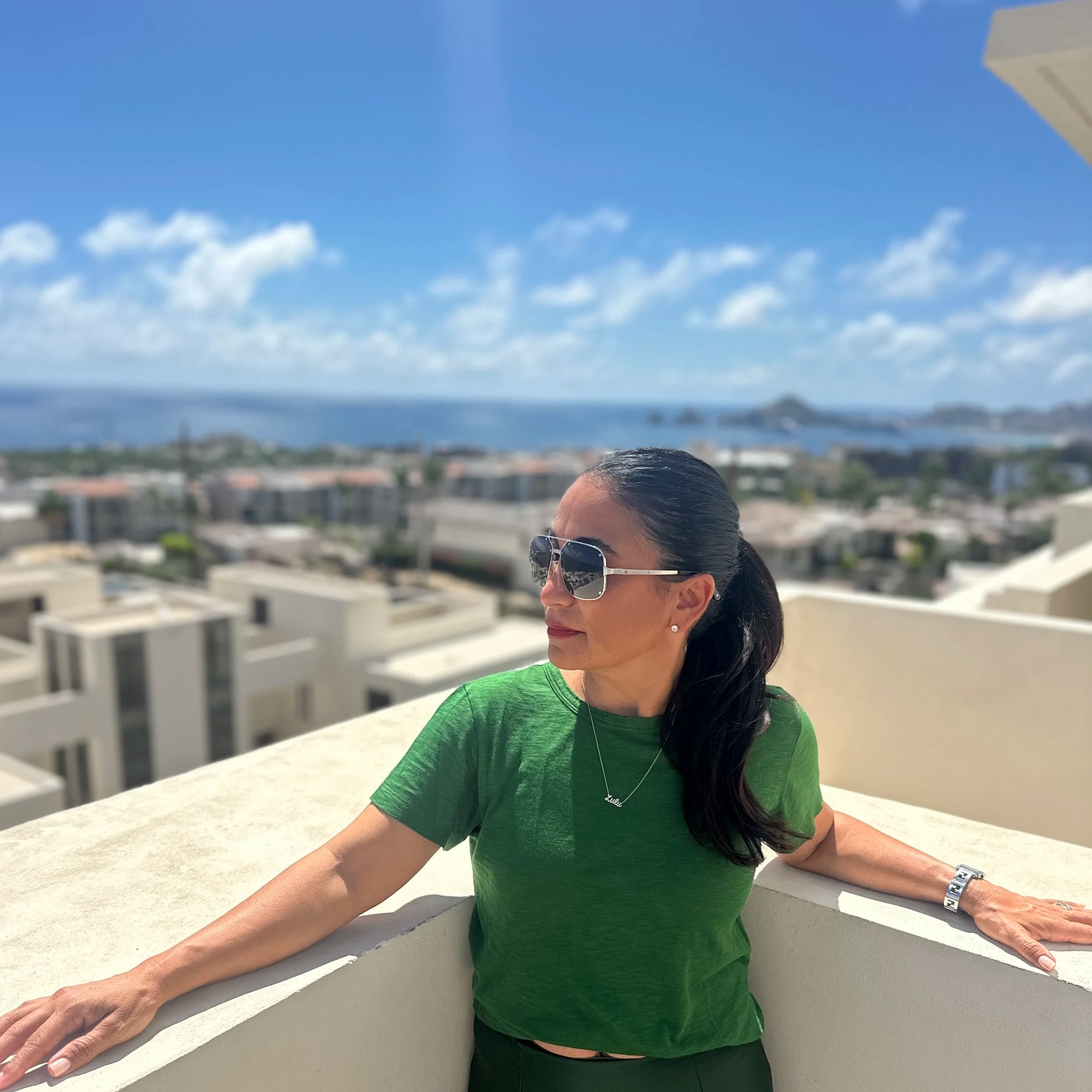 Lulu Bouillon, interior designer and founder of Lulu Bouillon Design, overlooking the Southern California coast.