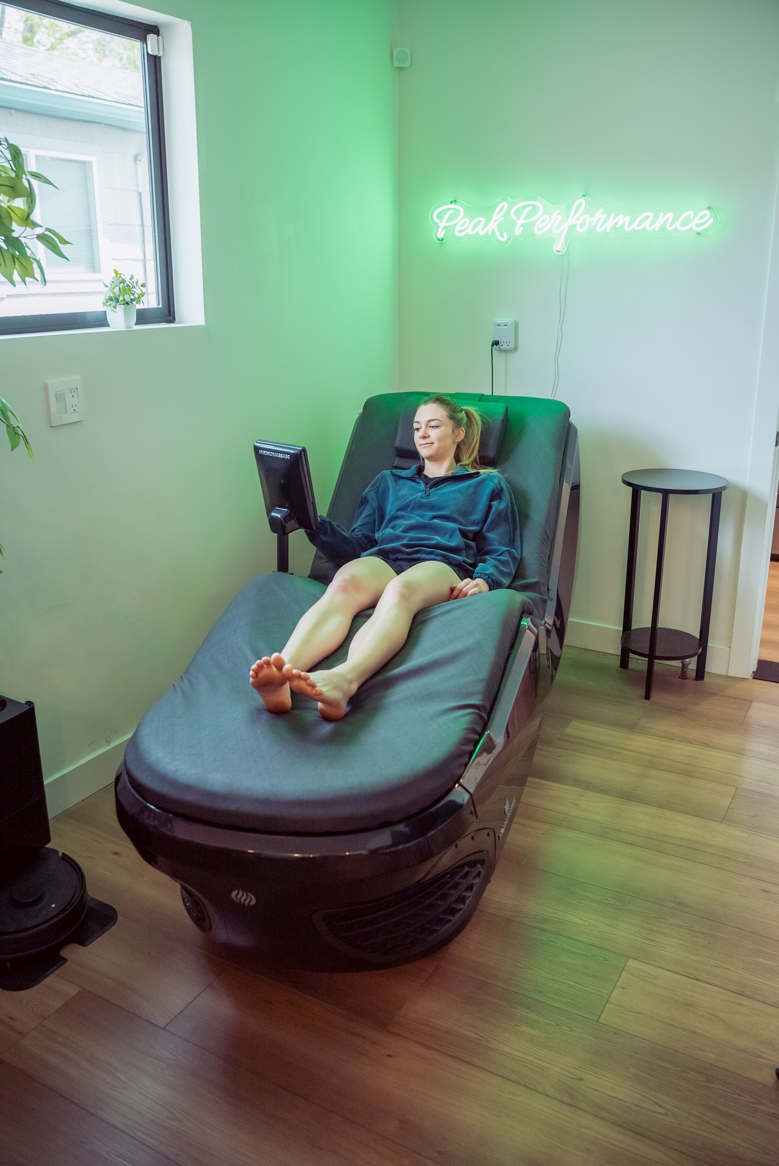 A man reclining for HydroMassage, designed for relaxation or therapy.