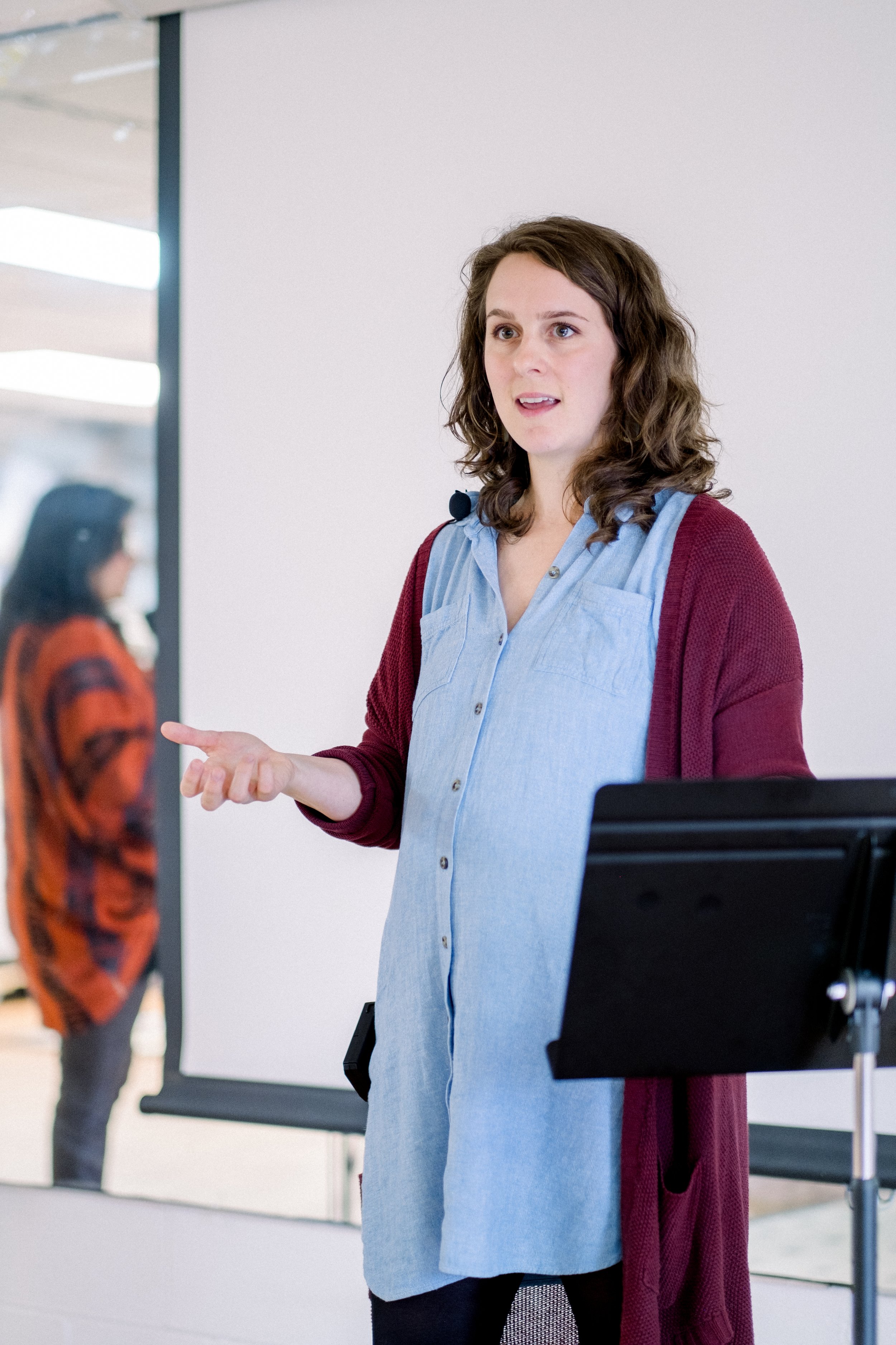 Woman preaching a sermon about God.