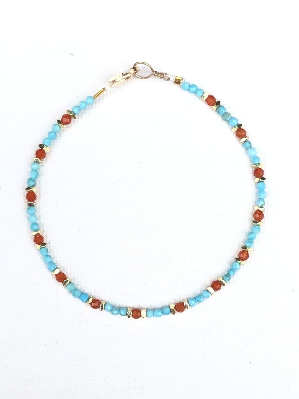 Tinie en turquoise