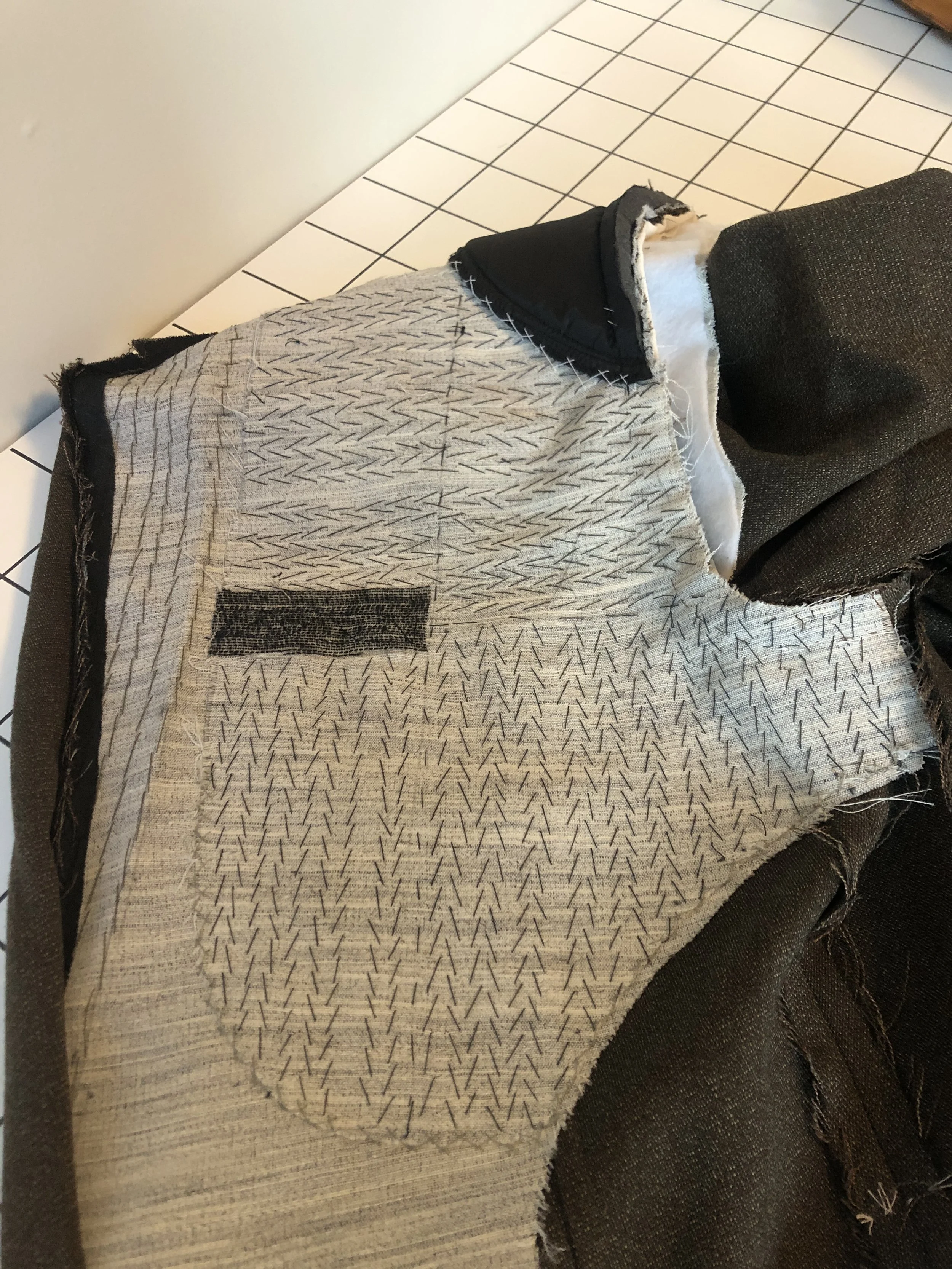 Inside front panel with pad stitching