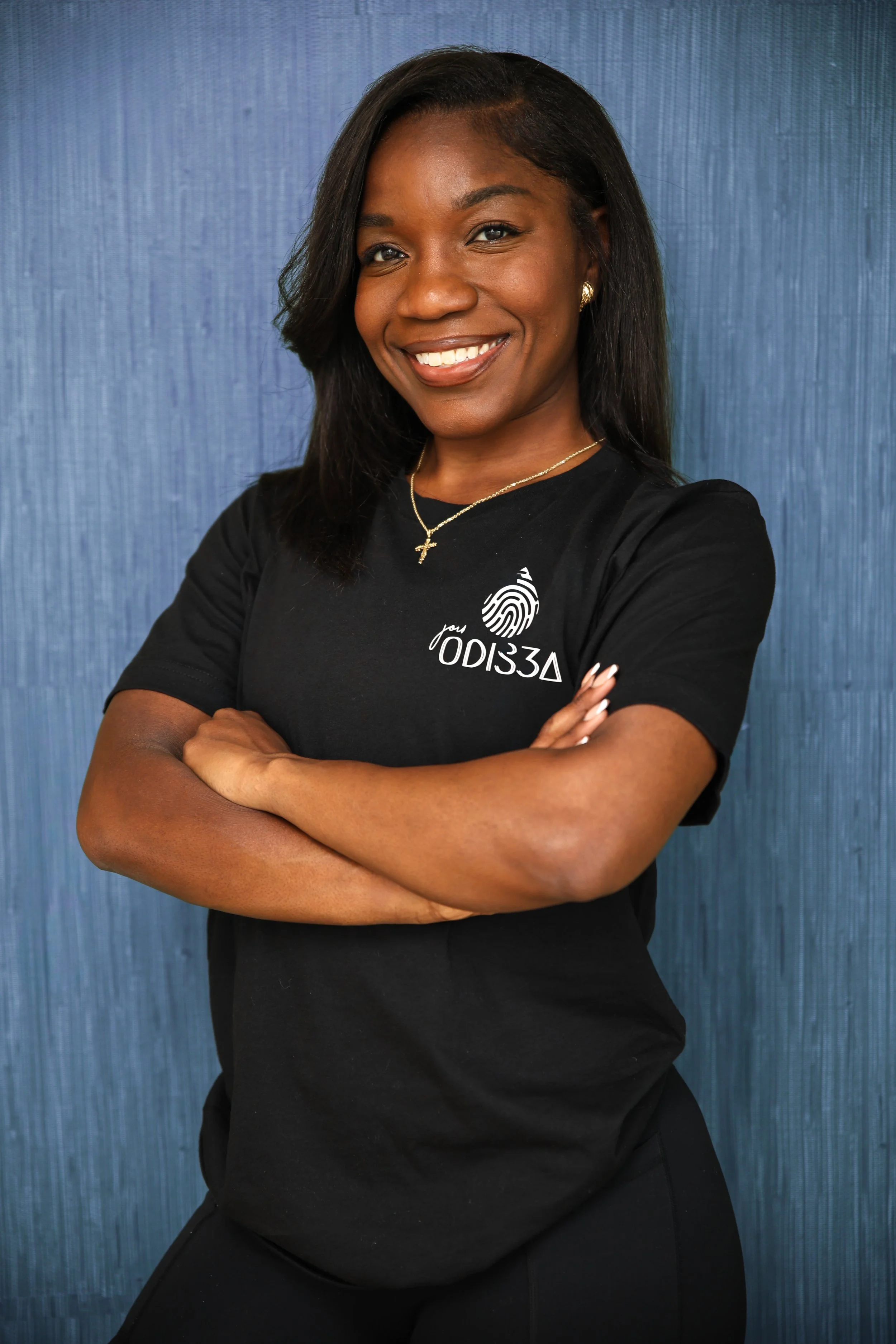 headshot of founder wearing black shirt