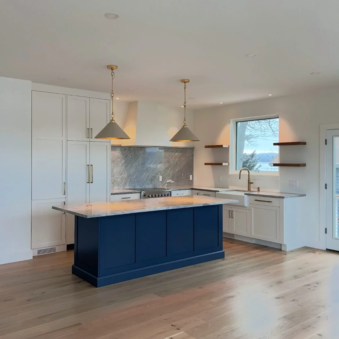 Good design isn&rsquo;t just how it looks &mdash; it&rsquo;s how it flows.

This kitchen anchors the home while keeping everything open to the water beyond.

Clean lines, natural materials, and a layout that actually works for how people live.

From 