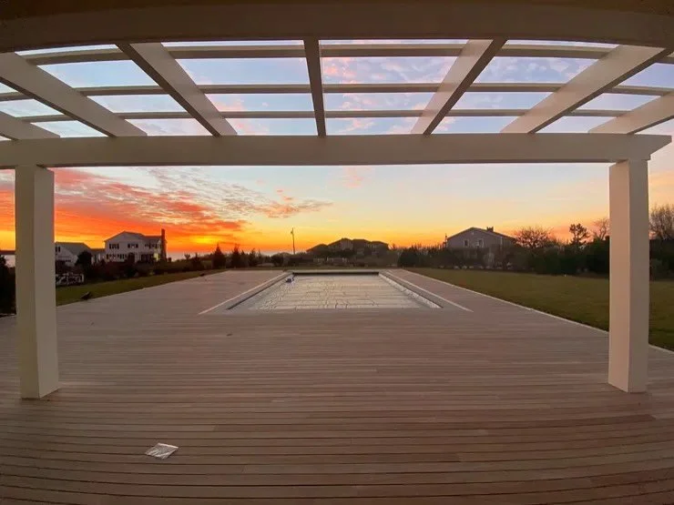 Ipe decking, bluestone, a pergola and a pool worthing floating in for every sunset 

Builder: @neillbros 
Architect: @dimauroarchitects 

#pool #deck #pergola #buildri #outdoorspaces