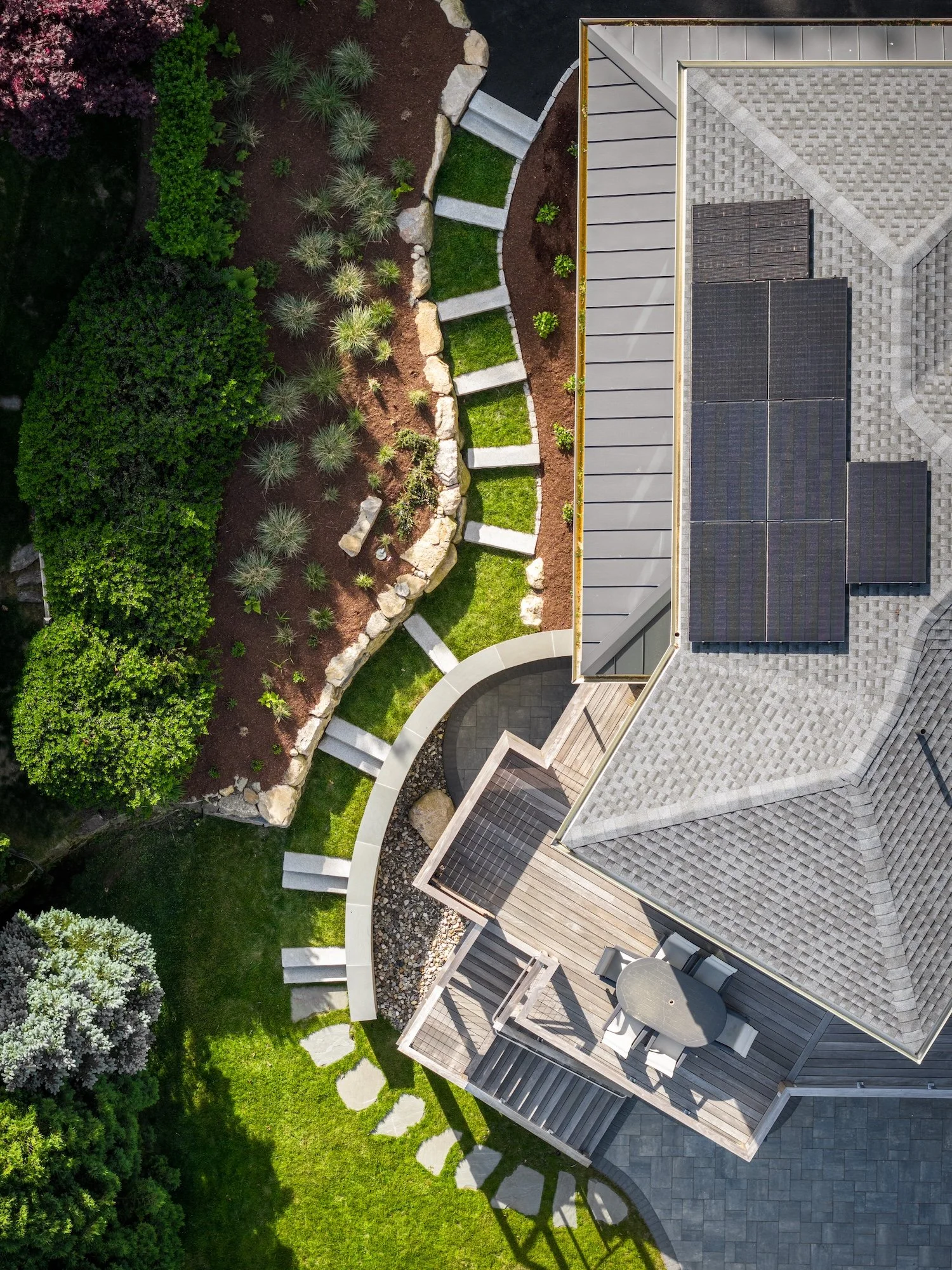 Aerial view of walkway to backyard of custom built Rhode Island Home