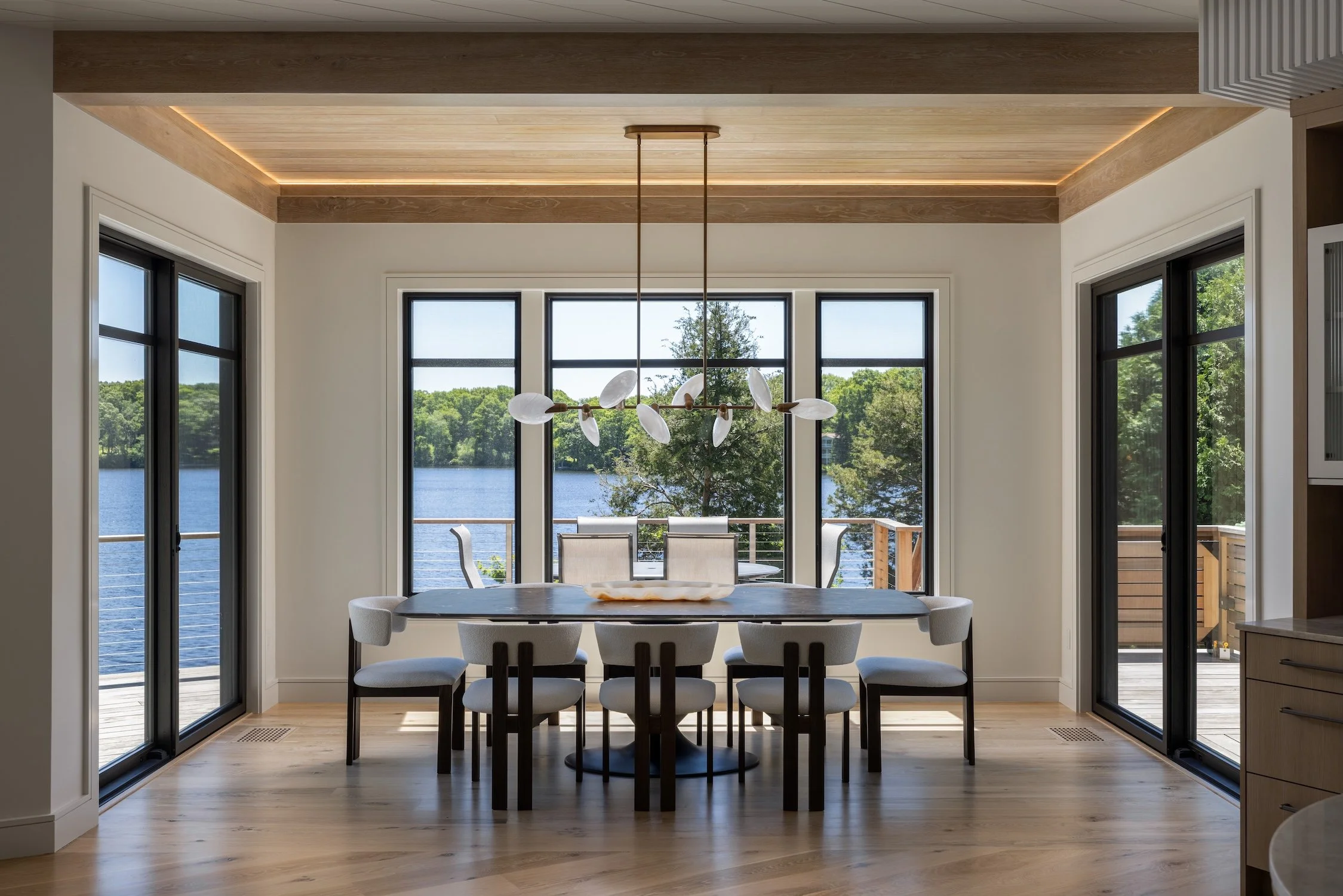dining table, pendant light, water views from dining room, 
