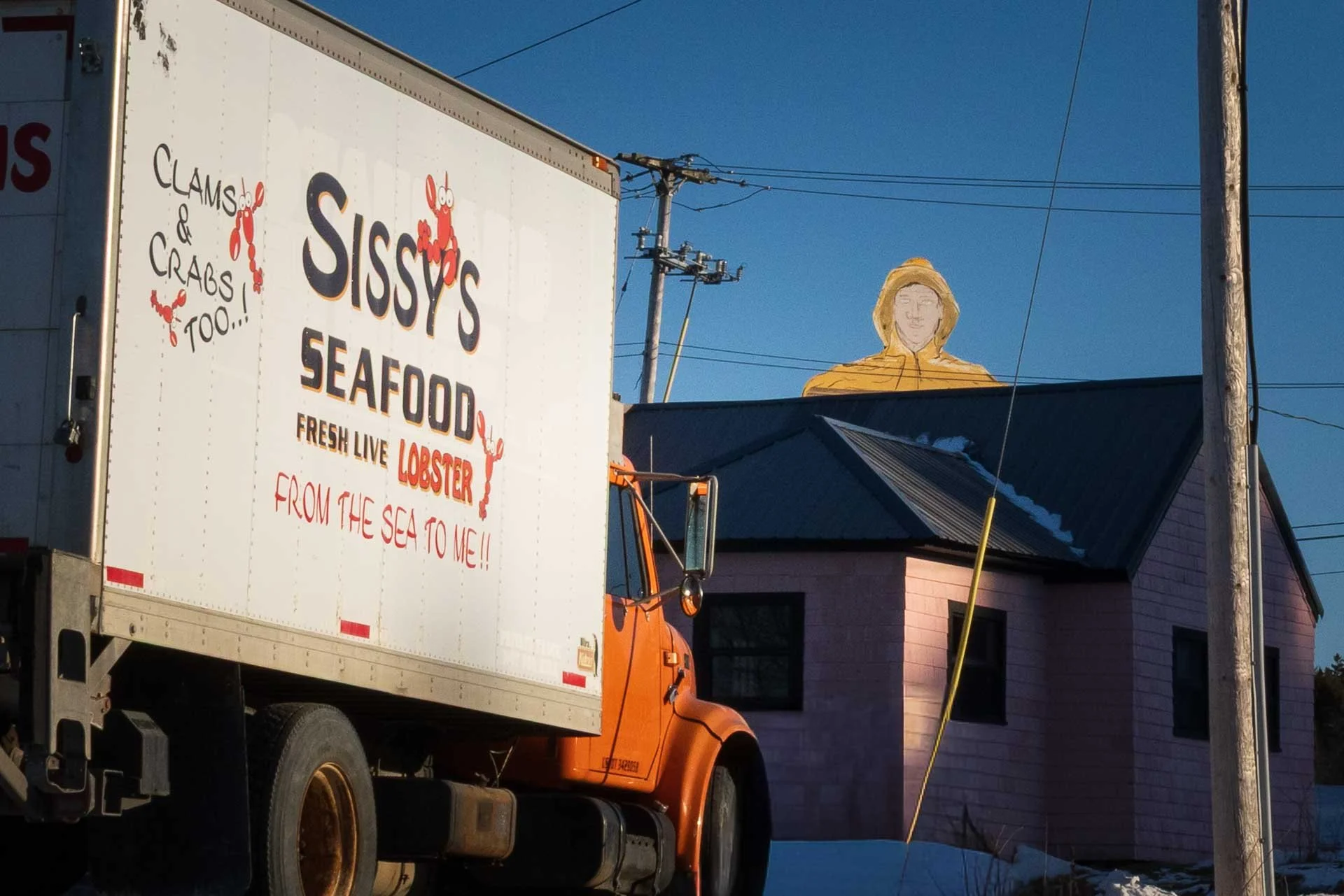 Winter in and around Acadia NP, Big Jim peaking over building
