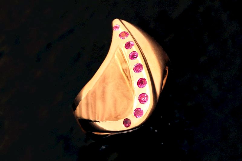 Coastal-Inspired Pink Sapphire Ring
A unique creation from the Legacy Collection, this 14K gold ring was inspired by a trip to the coast. Featuring a soft, reticulated texture on one side and a sleek, polished area adorned with flush-set, vivid pink 
