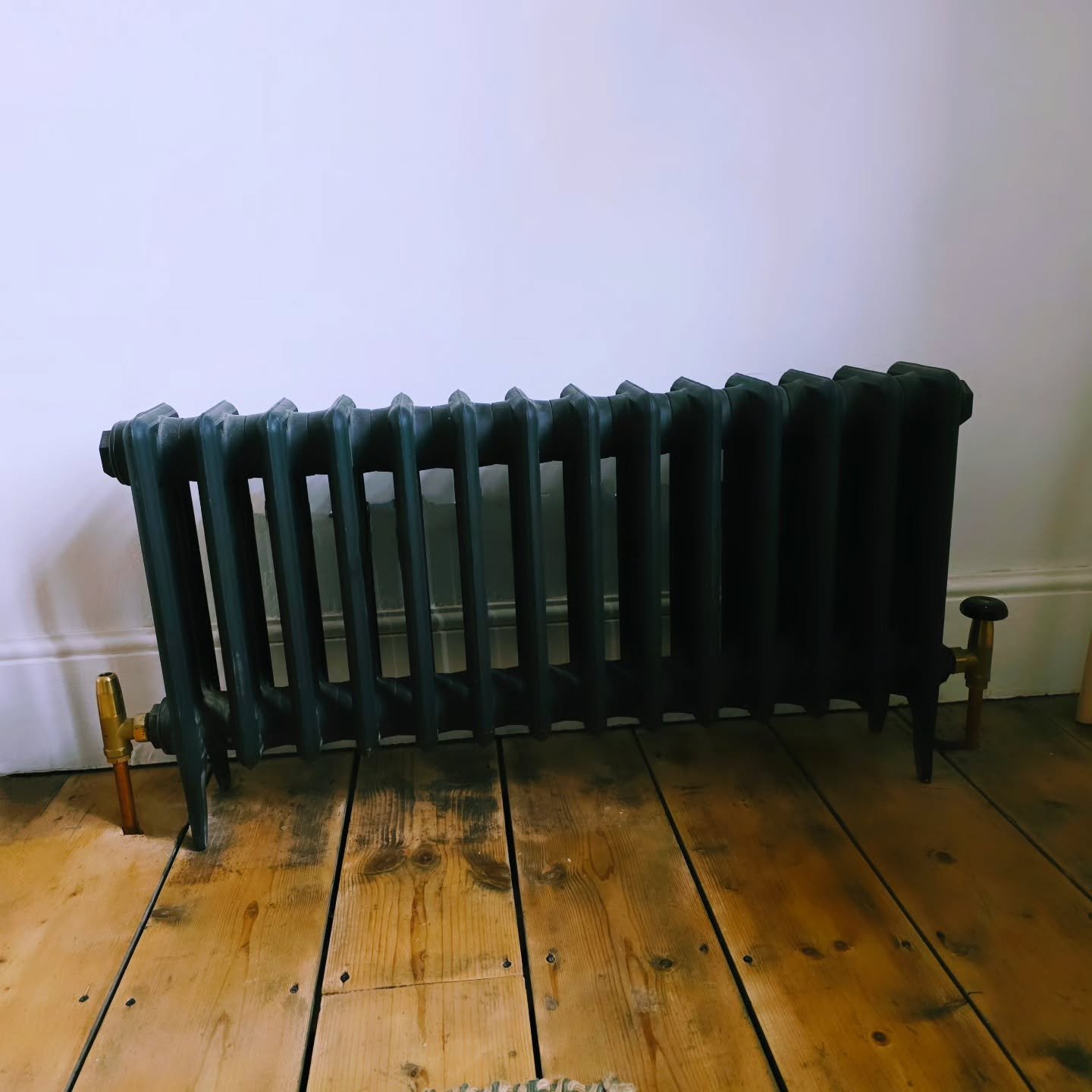 Designer radiator fitted to finish off this lounge renovation.