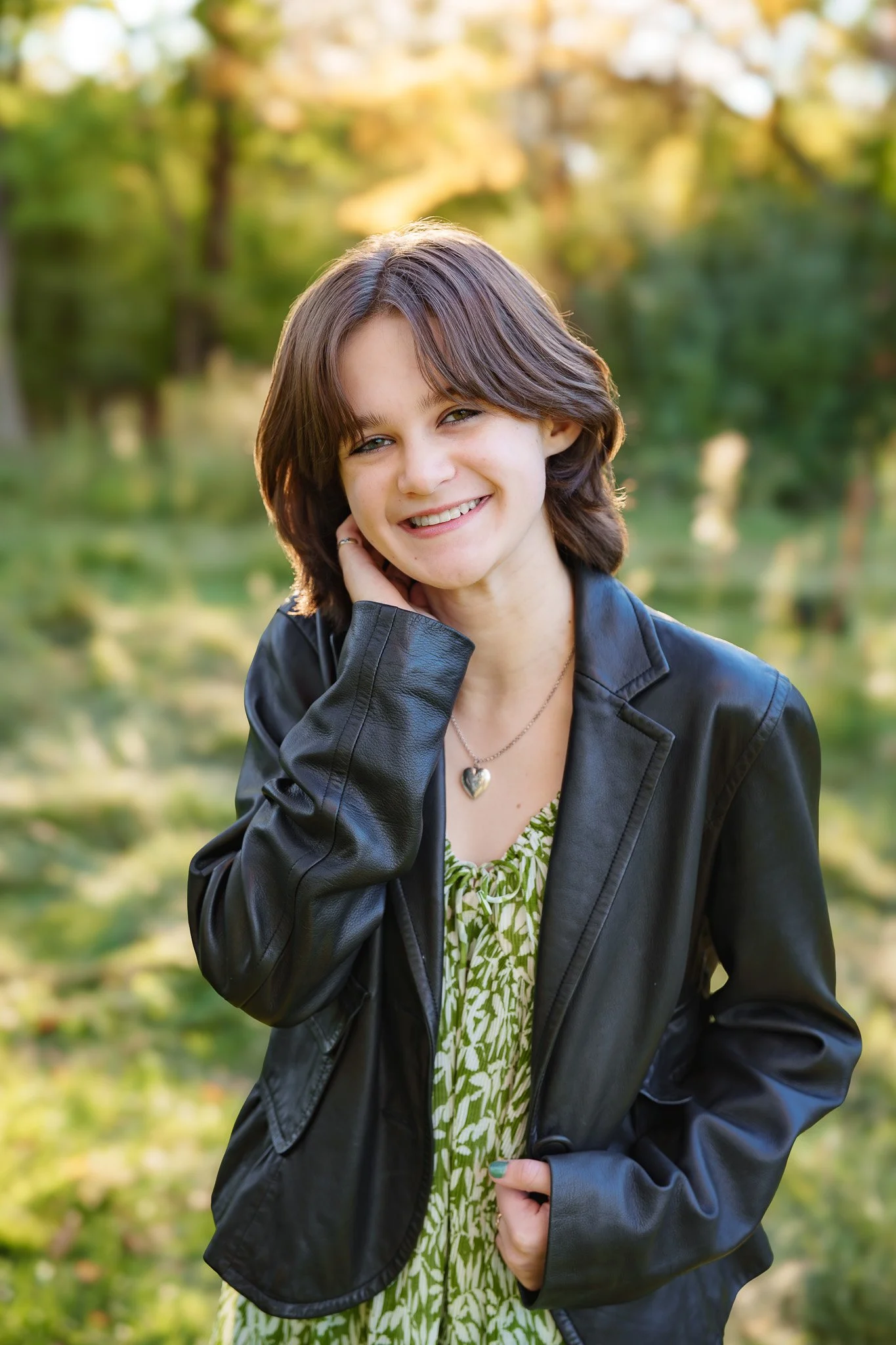 The soft light and natural greens of Kathryn Albertson Park created the perfect backdrop for this Boise senior photo session. Her outfit and confidence made the portraits feel timeless and true to her personality.