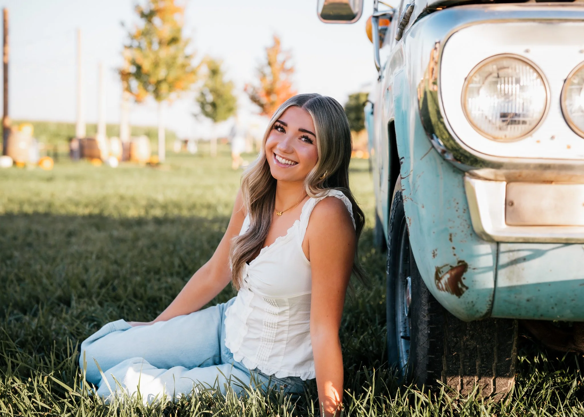 Senior session with a Ford truck making props a part of this photo session. This senior looks beautiful wearing a casual outfit. Boise, Eagle, Meridian, all of treasure Valley photographer.