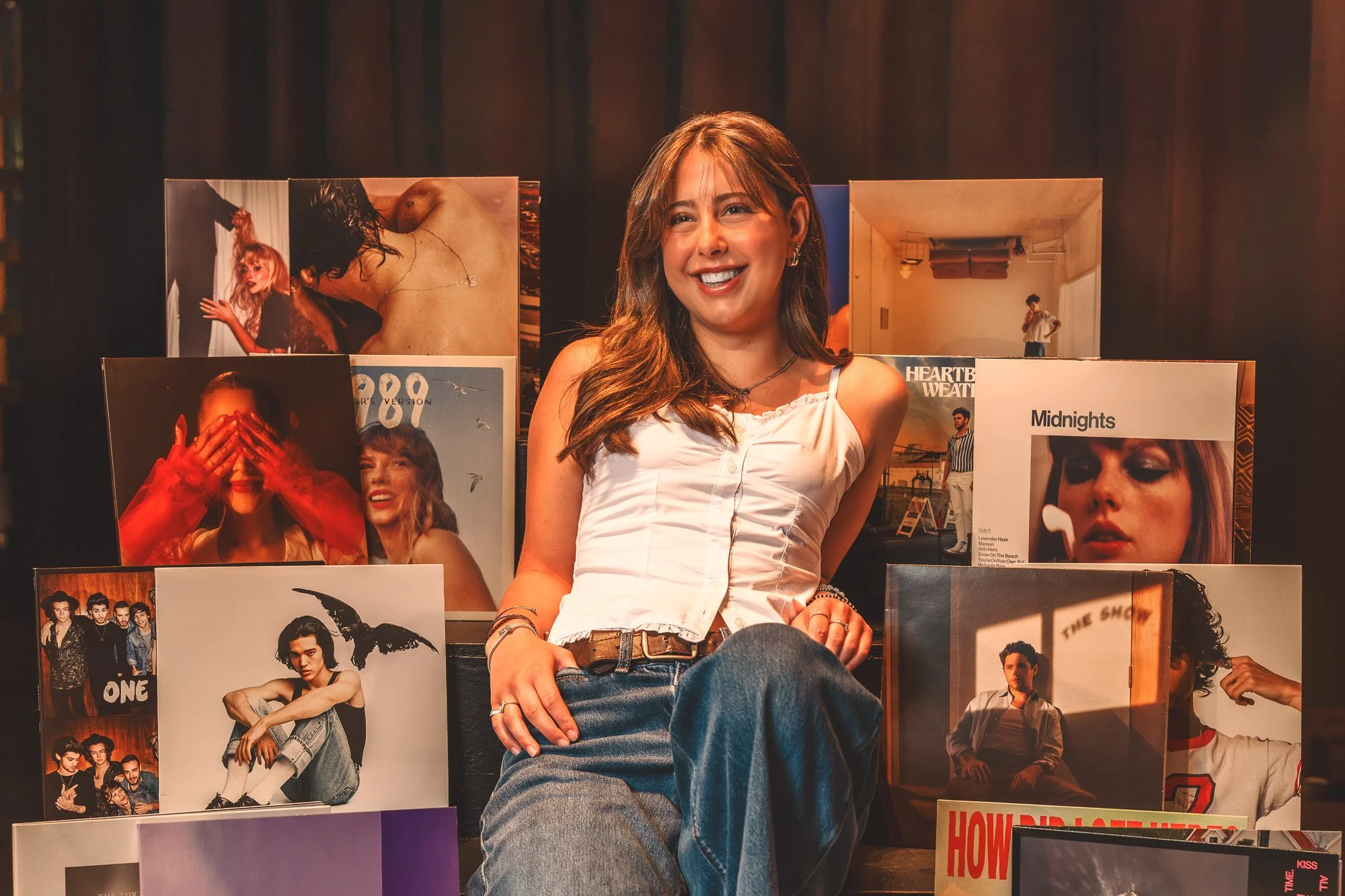 High school senior at her theater with all her favorite records 