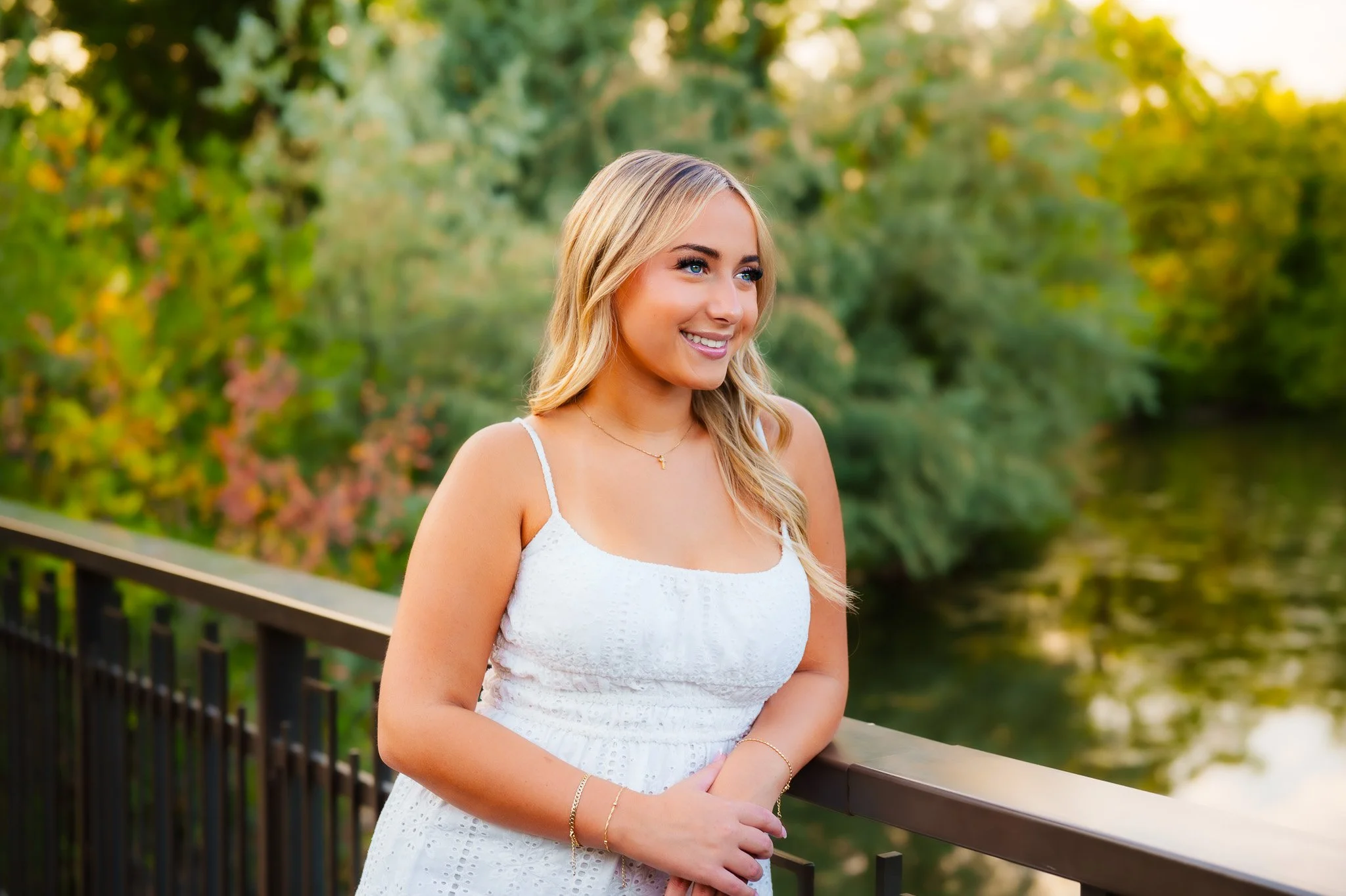  Senior in all white. Eagle high student getting her senior pictures done with a beautiful backdrop in Boise. Forever, my media photography.
