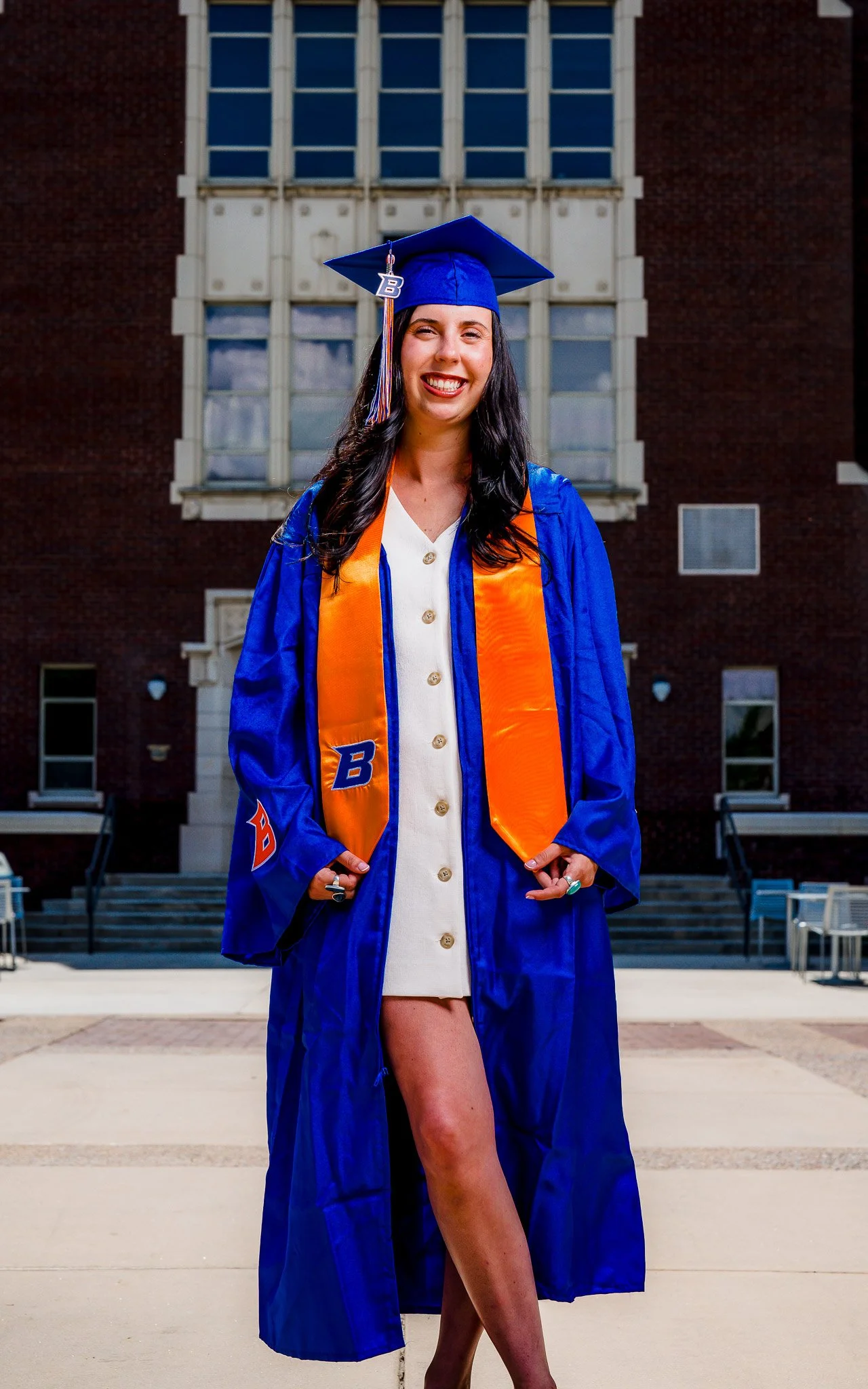 Boise State University graduation photo session featuring a proud senior in cap and gown. Celebrating milestones with vibrant, true-to-you grad photography across Boise, Meridian, Eagle, Star, and the Treasure Valley.