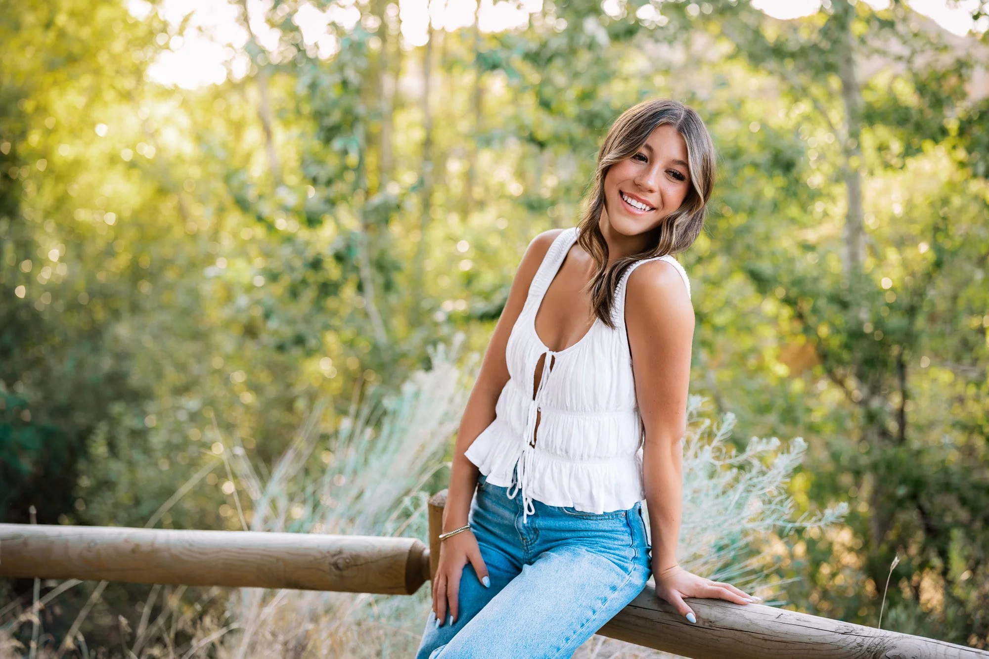 Senior session in the Boise foothills. Beautiful golden hour with an eagle high high school senior. Senior photography near me.