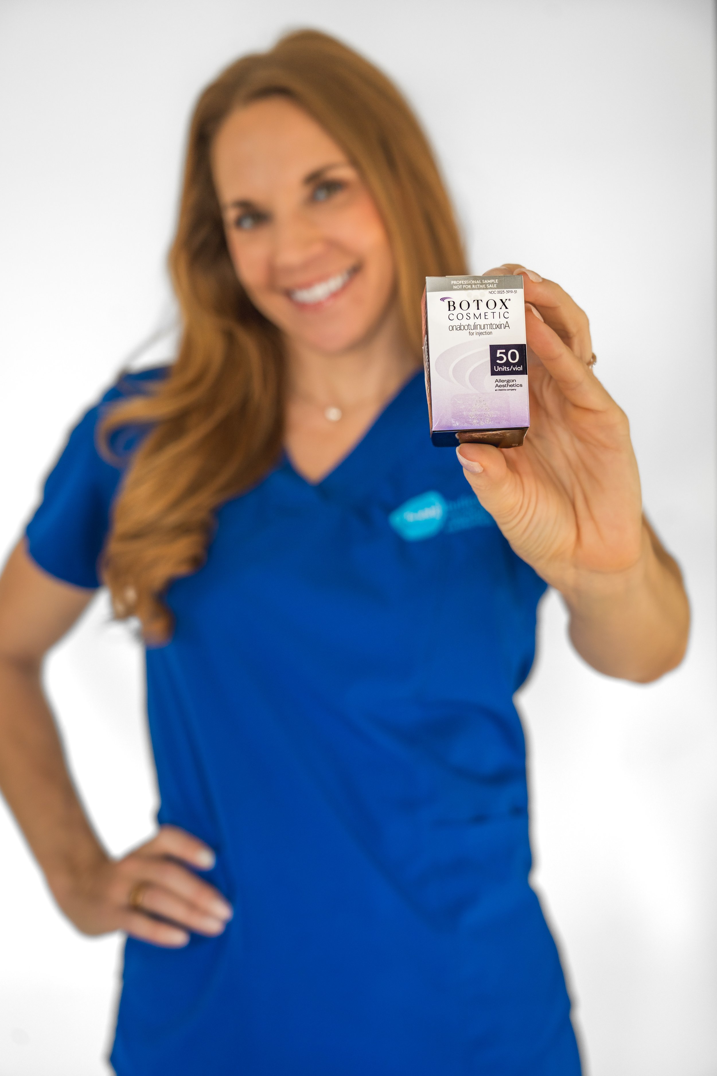 Branding portrait in the medical field in Boise, Idaho, captured in a dramatic indoor studio setting. Empowering photography for  entrepreneurs in Boise, Eagle, Meridian, Star, and the Treasure Valley. Forever My Media Headshots 