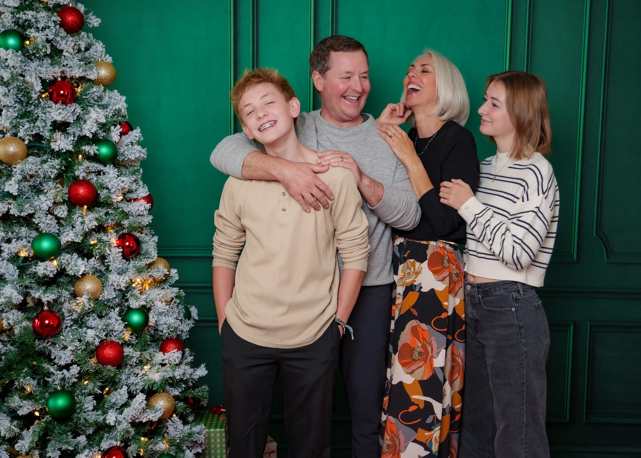 Christmas mini session with forever my media in Eagle, Idaho. A sweet family laughing together during the Christmas season.