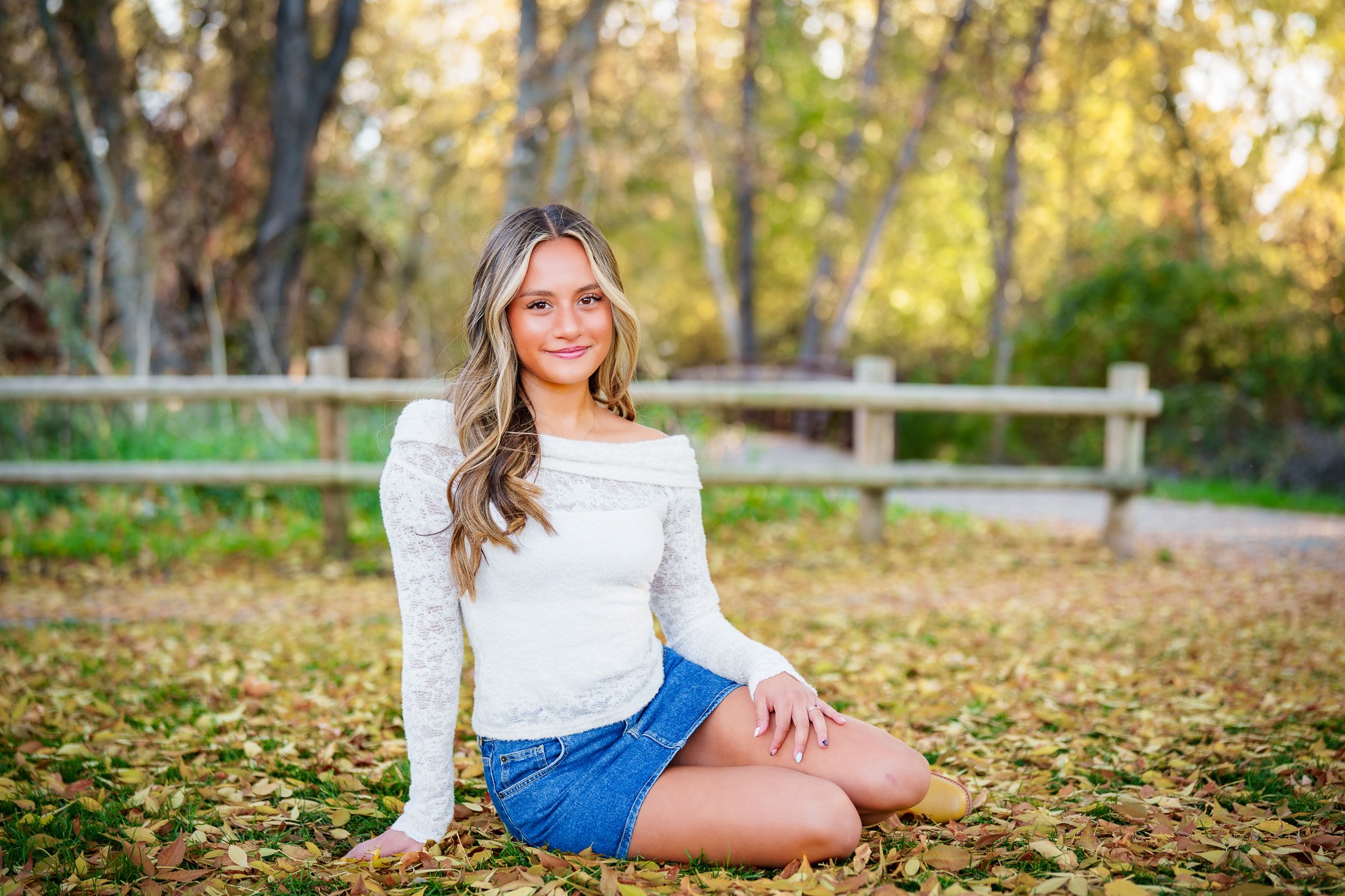 This senior session in Eagle captured the beauty of fall at Merrill Park. The golden leaves, soft light, and relaxed style made these portraits feel classic and full of personality — the kind of photos every senior deserves.