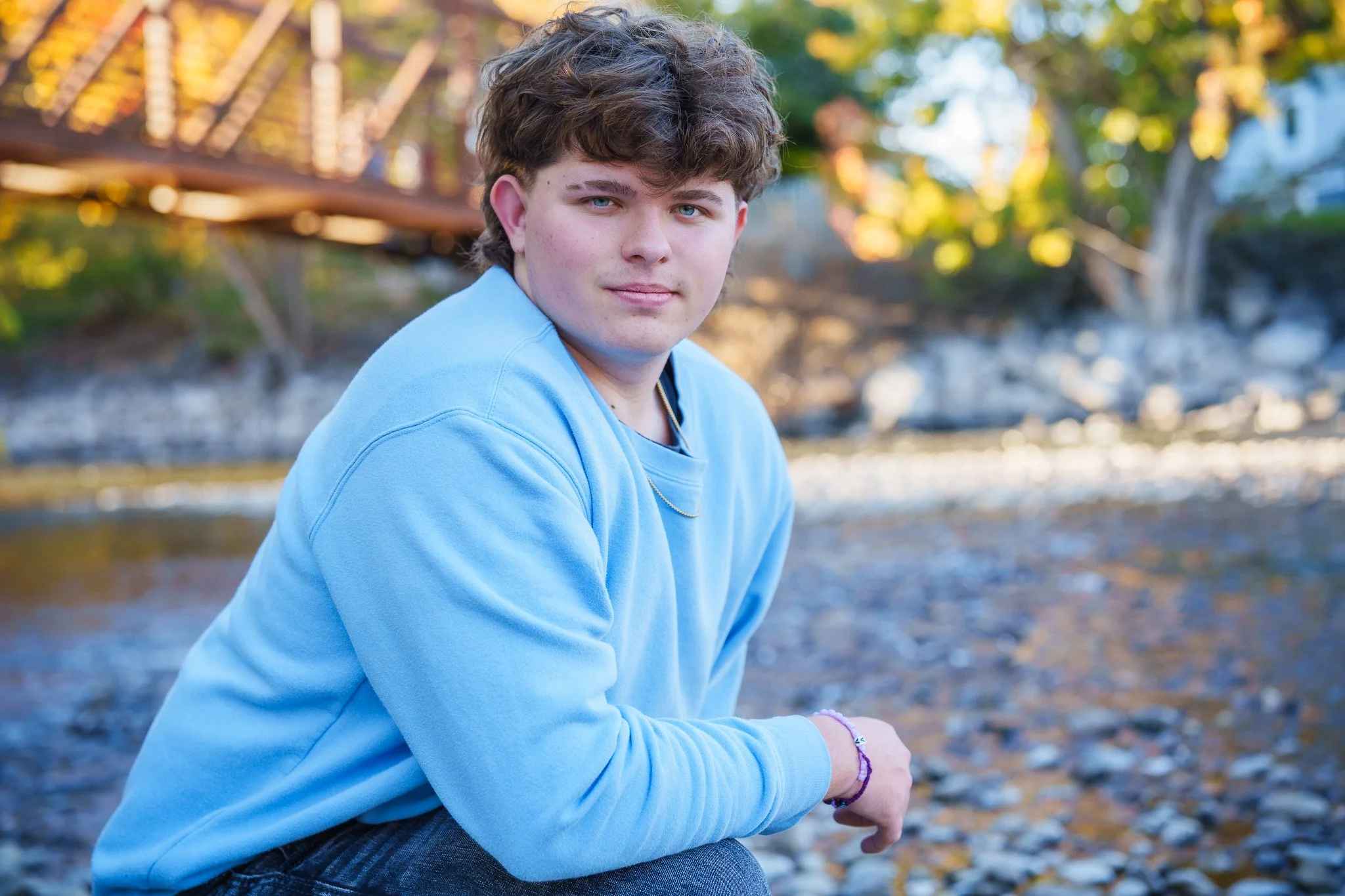Senior portraits at Merrill Park in Eagle are always beautiful with the soft light reflecting off the river. This relaxed senior session captured genuine confidence and personality — exactly what Forever My Media is known for across the Treasure Vall