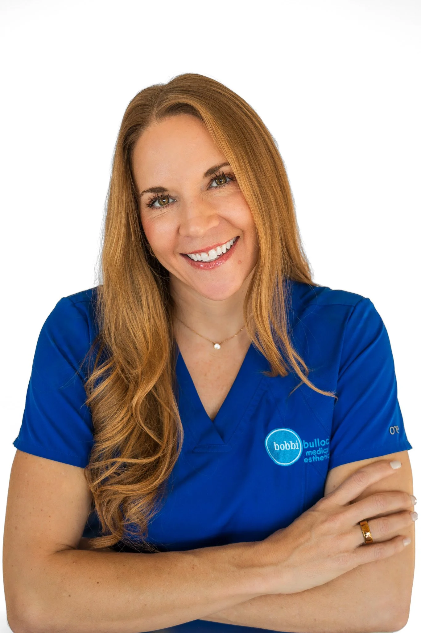 Professional headshot of a female client in Eagle, Idaho, with a clean light backdrop and confident, approachable posture. Branding photography for entrepreneurs and professionals in Boise, Eagle, Star, Meridian, and throughout the Treasure Valley. F