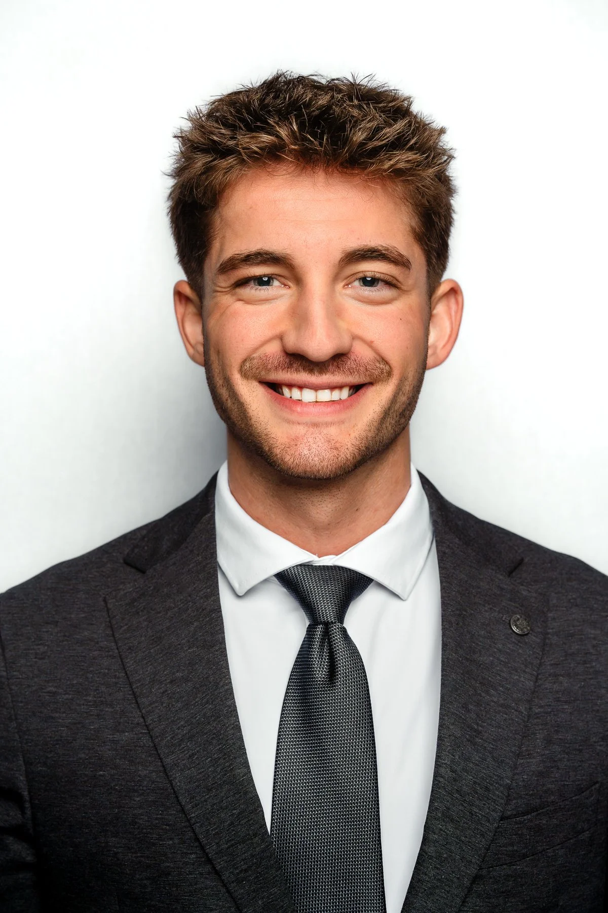 Professional male headshot with studio lighting at Forever My Media Eagle Idaho