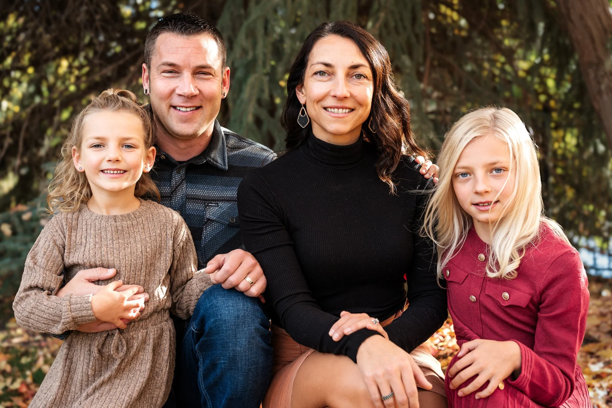 Family portrait with two little girls at a park in Eagle Idaho