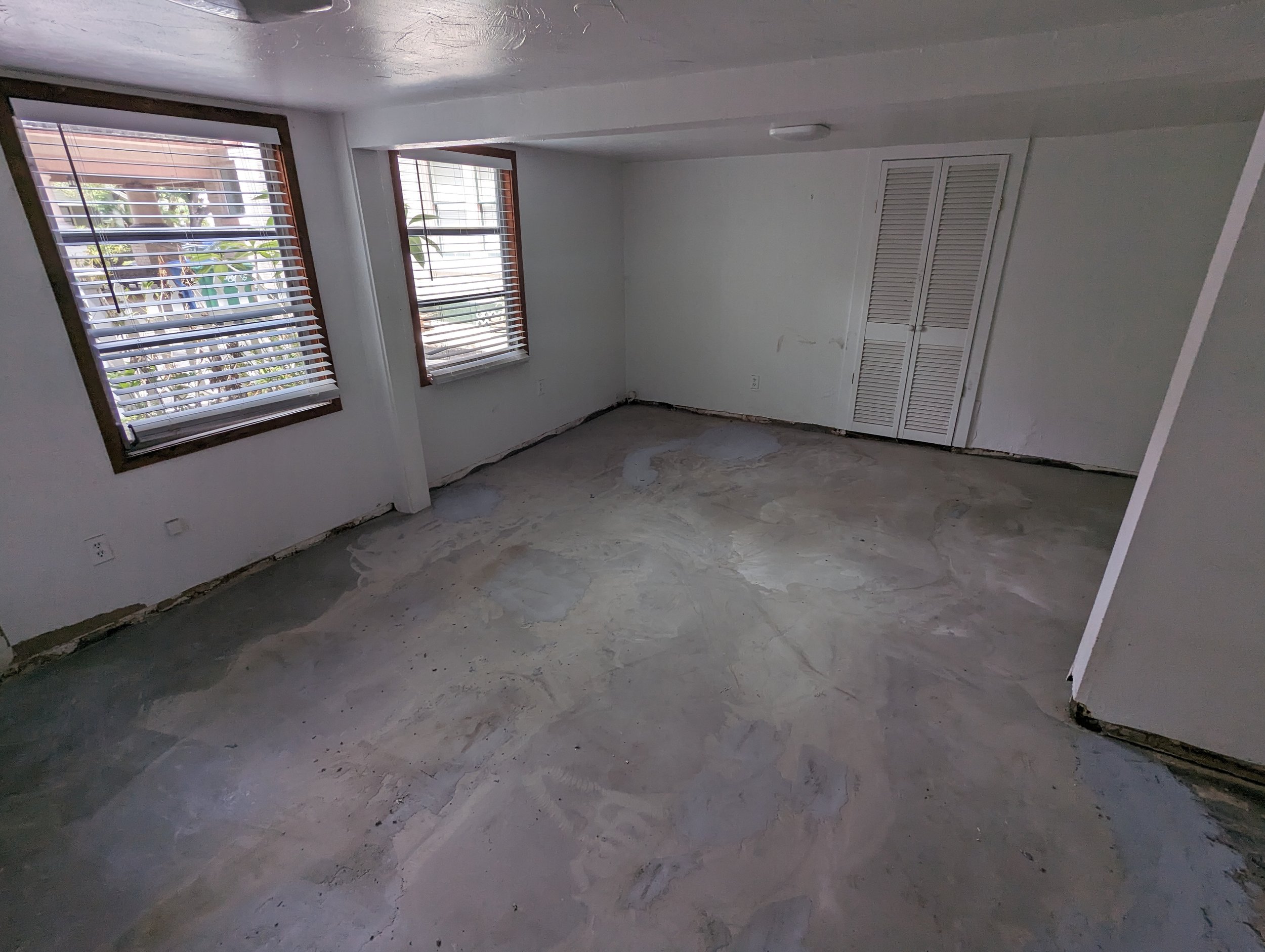 AIRBNB RENOVATION - Poured concrete to level out floor.
