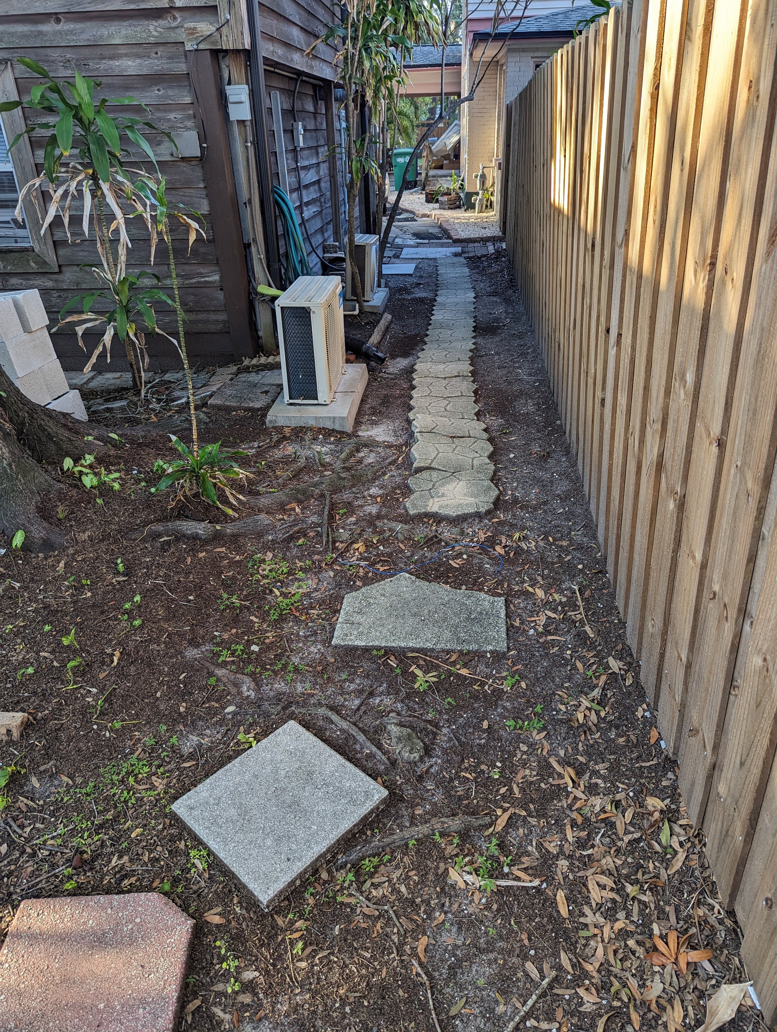 AIRBNB RENOVATION - Walkway to side of front yard. (Before)