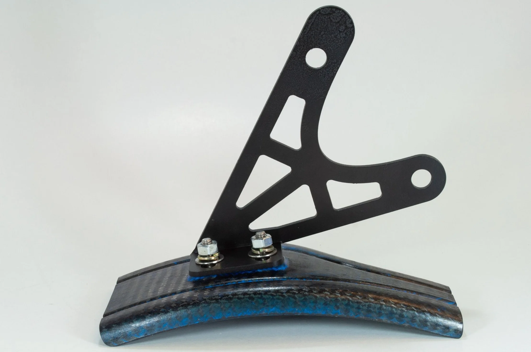 A water cut steel mounting bracket resists impacts when on track.