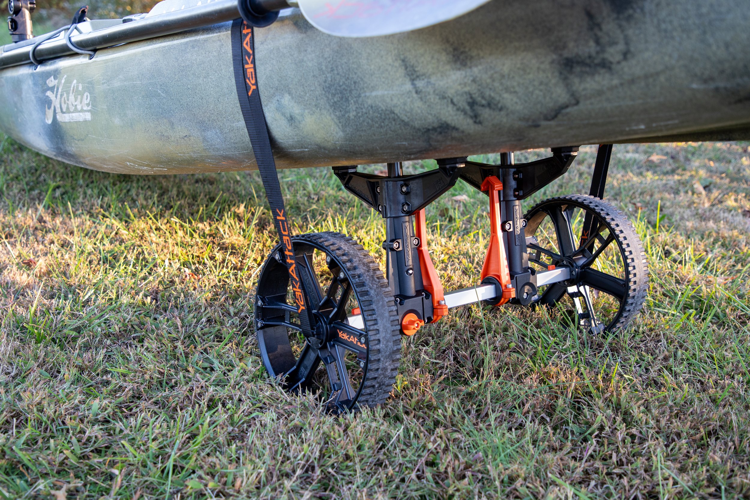 Hobie Outback kayak strapped down to the Tow N Stow Scupper Cart