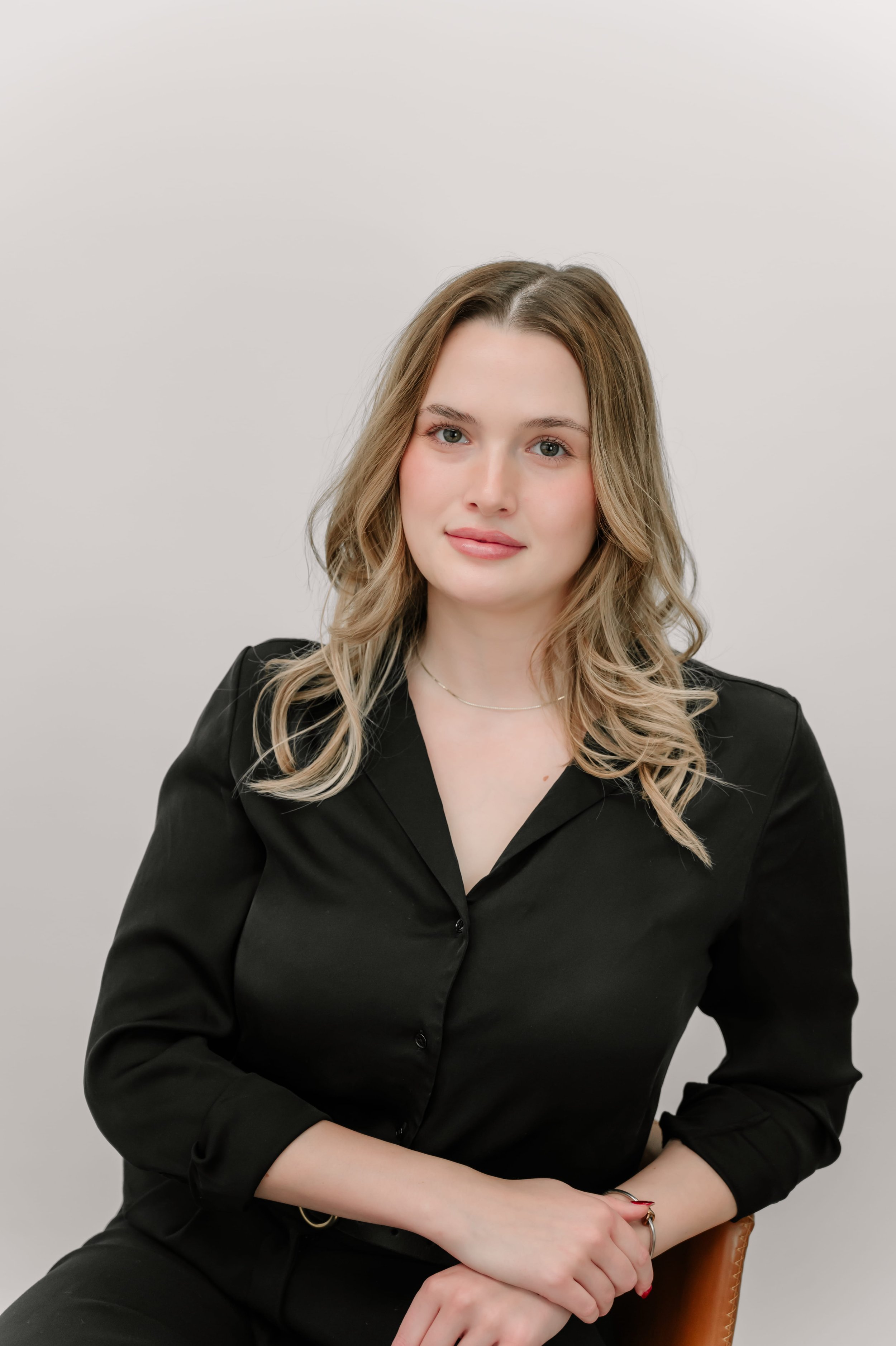 Photo of Nicole German, front desk coordinator at bare. medical aesthetics in Flagstaff, AZ, providing exceptional customer service and support for all aesthetic treatments and appointments.