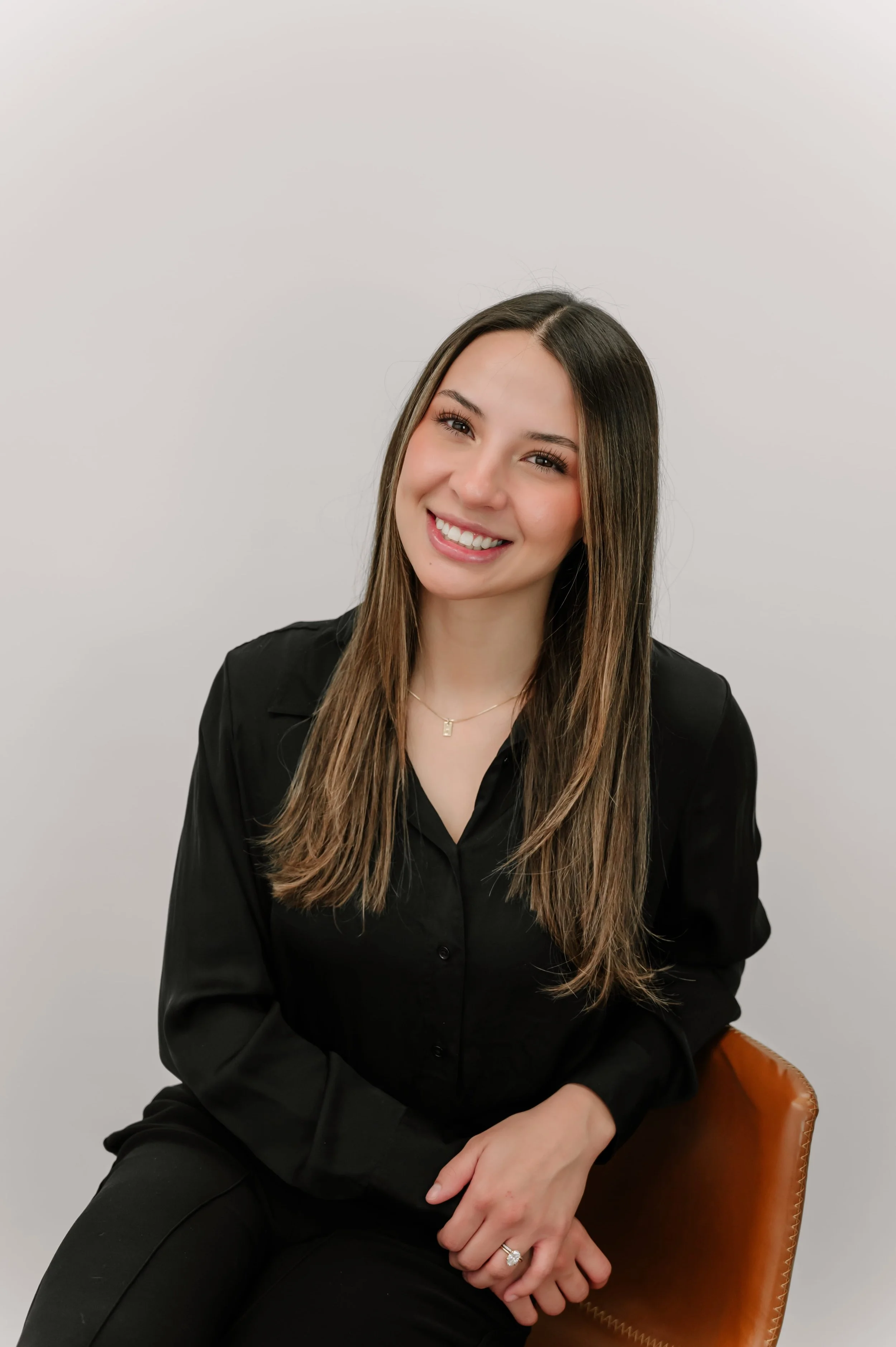Photo of Kekoa Sabino, licensed aesthetician at bare. medical aesthetics in Flagstaff, AZ, specializing in body waxing, SkinPen microneedling, dermaplaning, DiamondGlow facials, VI Peels, lash and brow tints, lash lifts, and brow laminations.