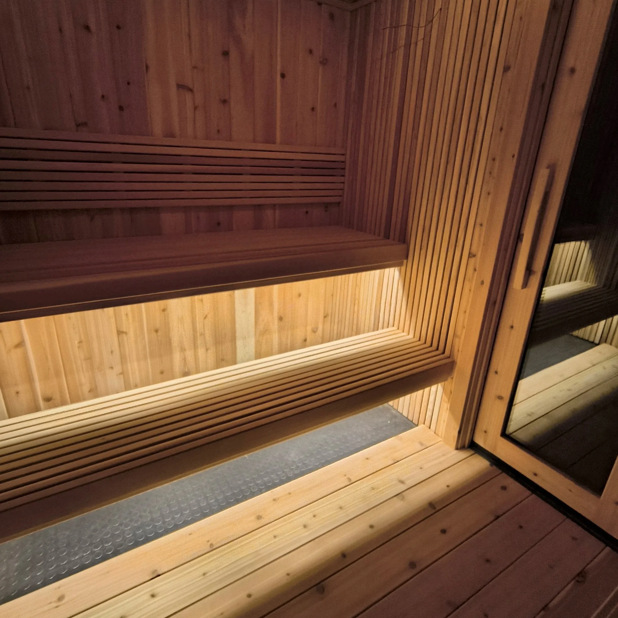 Handcrafted outdoor sauna built locally using premium cedar wood and traditional sauna heating