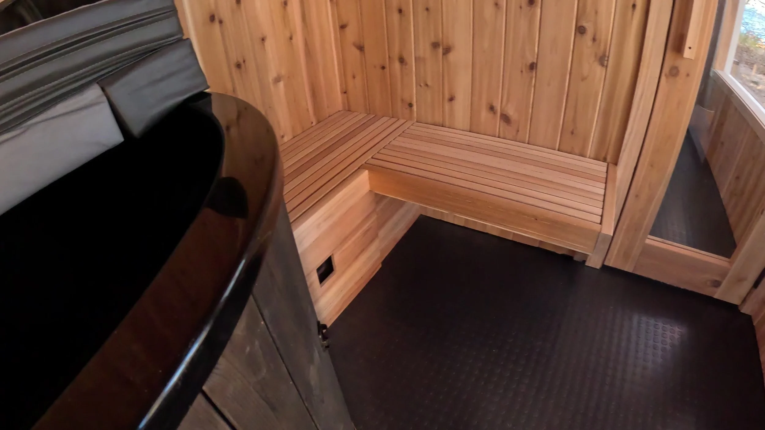 Modern traditional outdoor sauna with cold plunge local design build installation luxury handcrafted