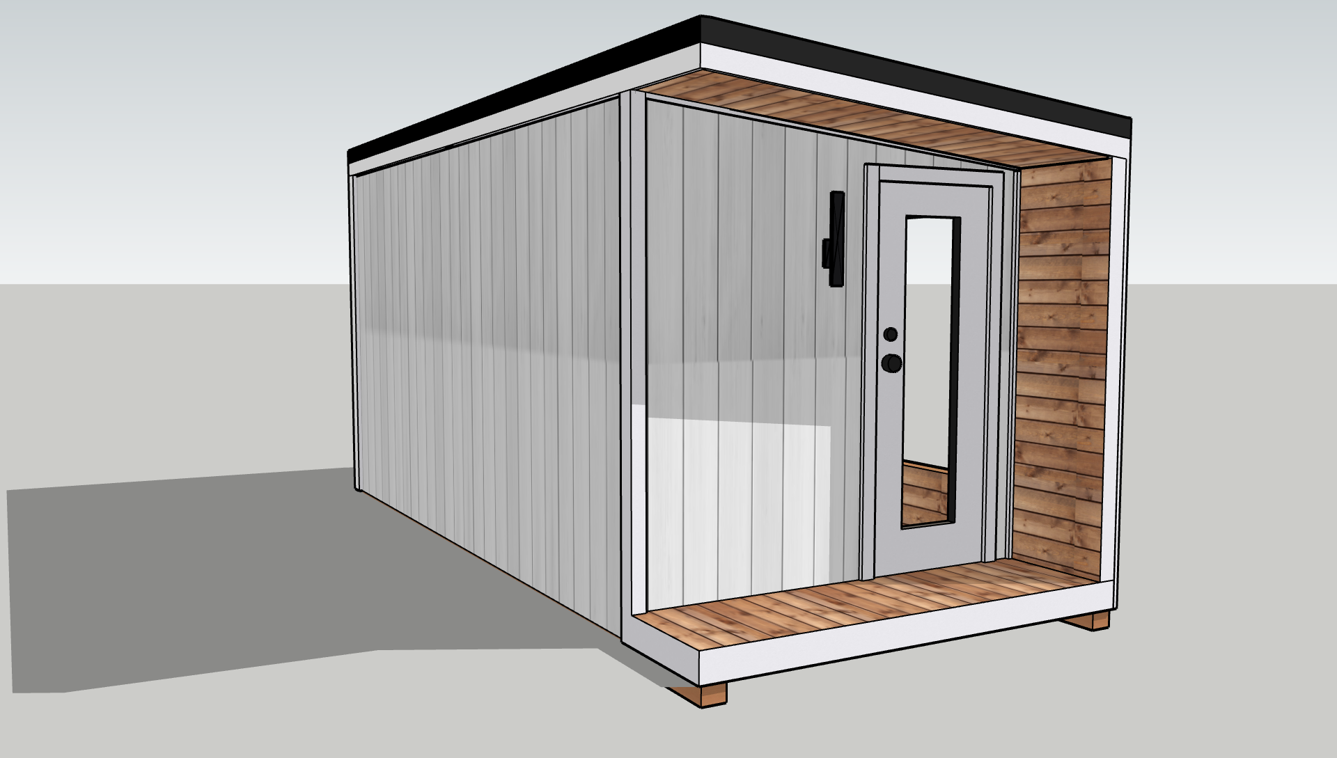 A small modern shed with gray vertical siding, a glass-paneled door, and wood accents, positioned on a gray surface with shadows.