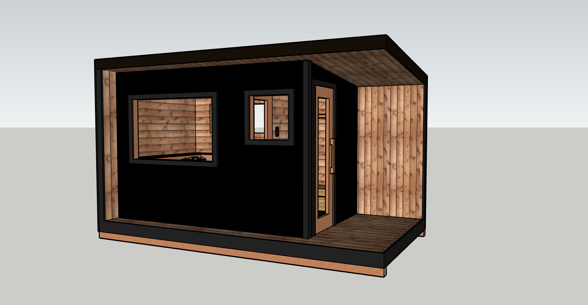 A small modern outdoor structure with a black exterior, wooden interior walls, and a wooden deck. It features a door with a handle and two windows, one larger with a view into the interior and one smaller. The interior is made of wood paneling, creat